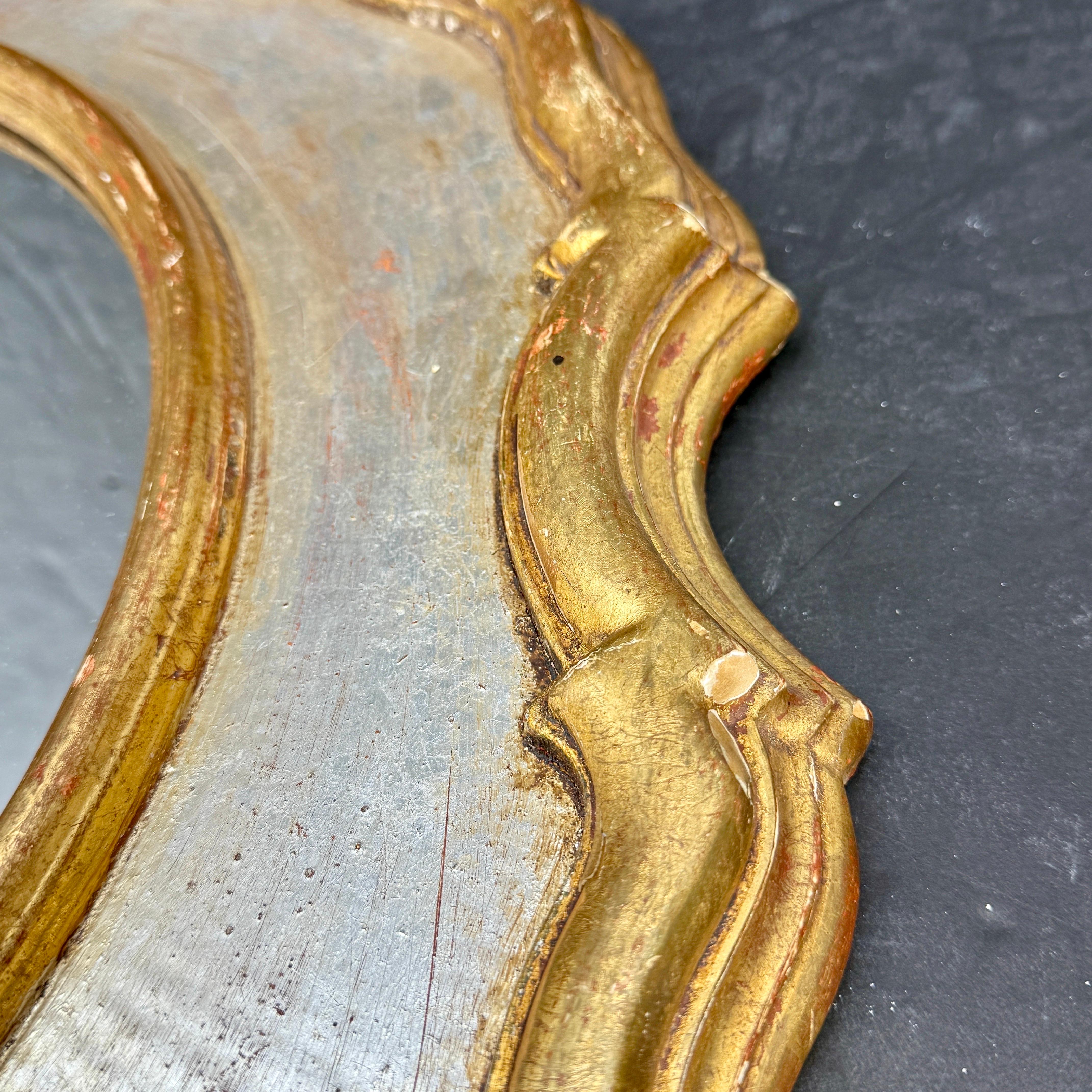 Legno Specchio ovale d'epoca Florentine in oro e argento dorato in vendita