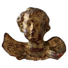 Plaque murale vintage italienne de style florentin, en bois doré sculpté à la main, représentant un chérubin « putto »