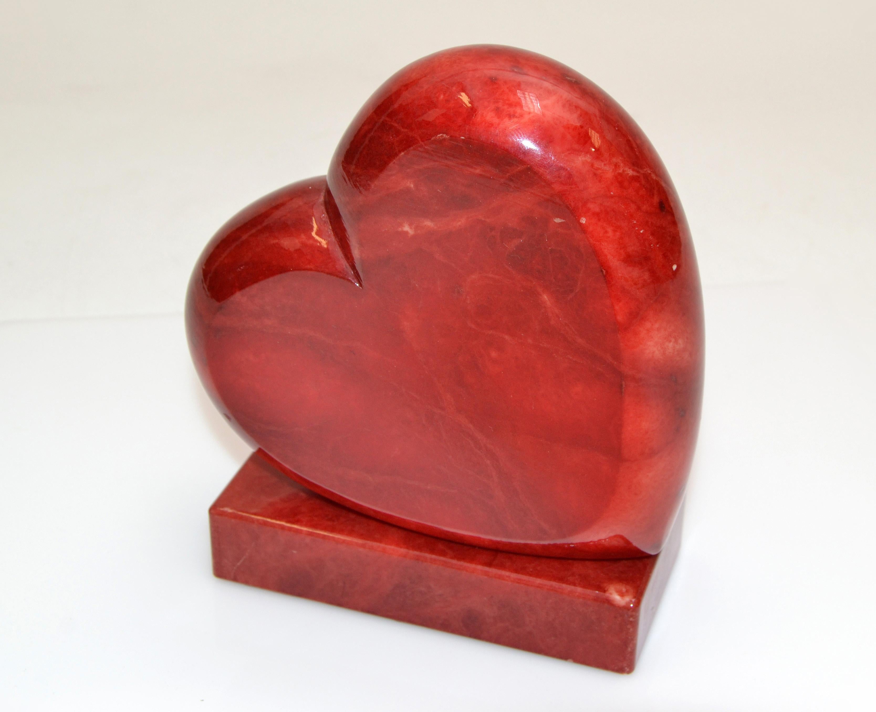 Lovely mothers day or wedding gift idea.
A genuine hand carved red alabaster heart table sculpture or bookend, made in Italy.
Original foil label underneath.