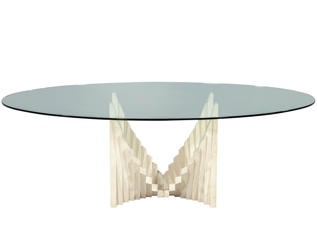 Vintage Italian geometric travertine oval dining table. Unique Italian made geometric design travertine stone base with oval glass top. Glass top has minor scratching consistent with age and use.
Price includes complimentary delivery to the