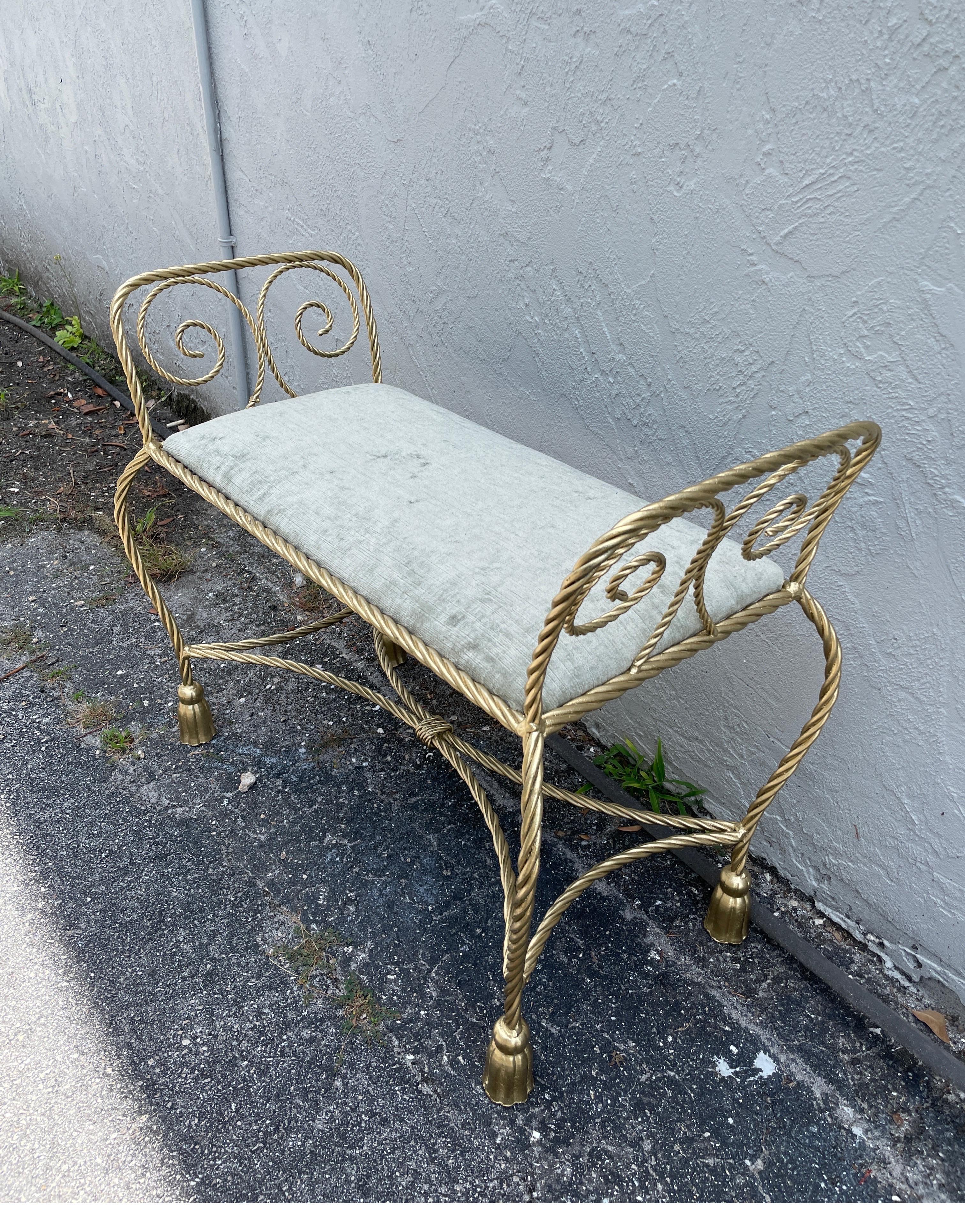 Vintage Italian gilded metal bench with newly upholstered seat cushion.