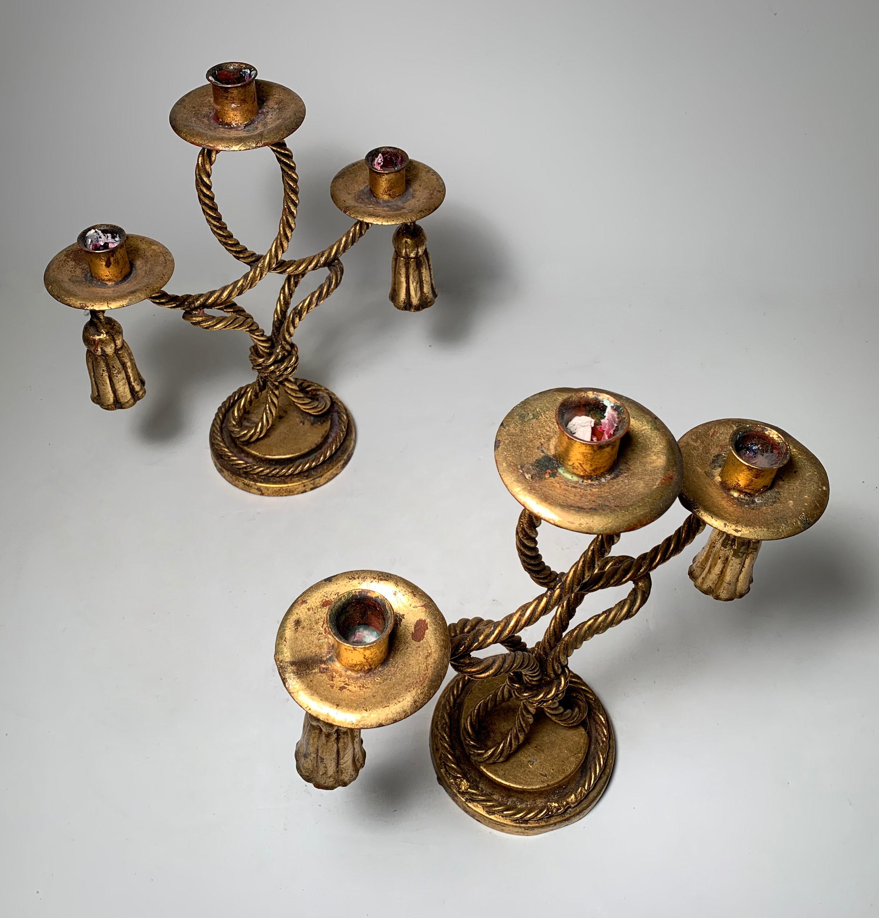Vintage Italian gilt decorative toleware rope and tassle candlesticks.