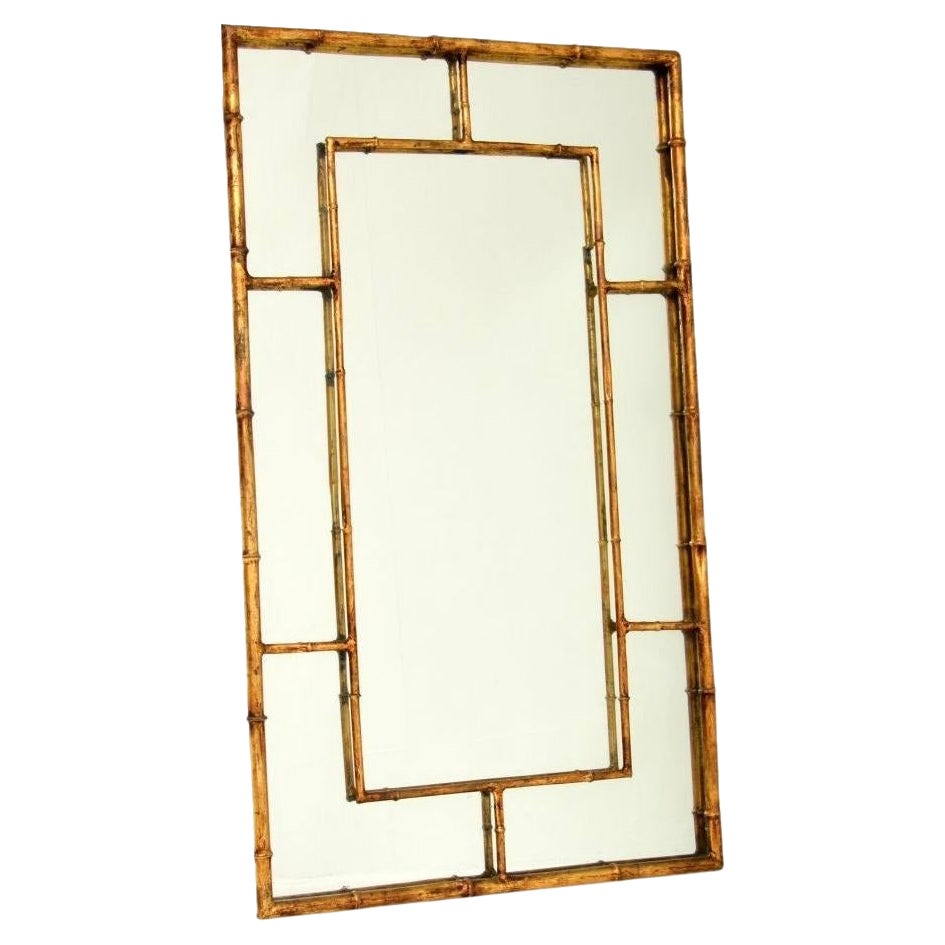 Miroir italien vintage en métal doré