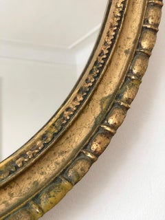 Specchio ovale in legno dorato italiano d'epoca - anni '80