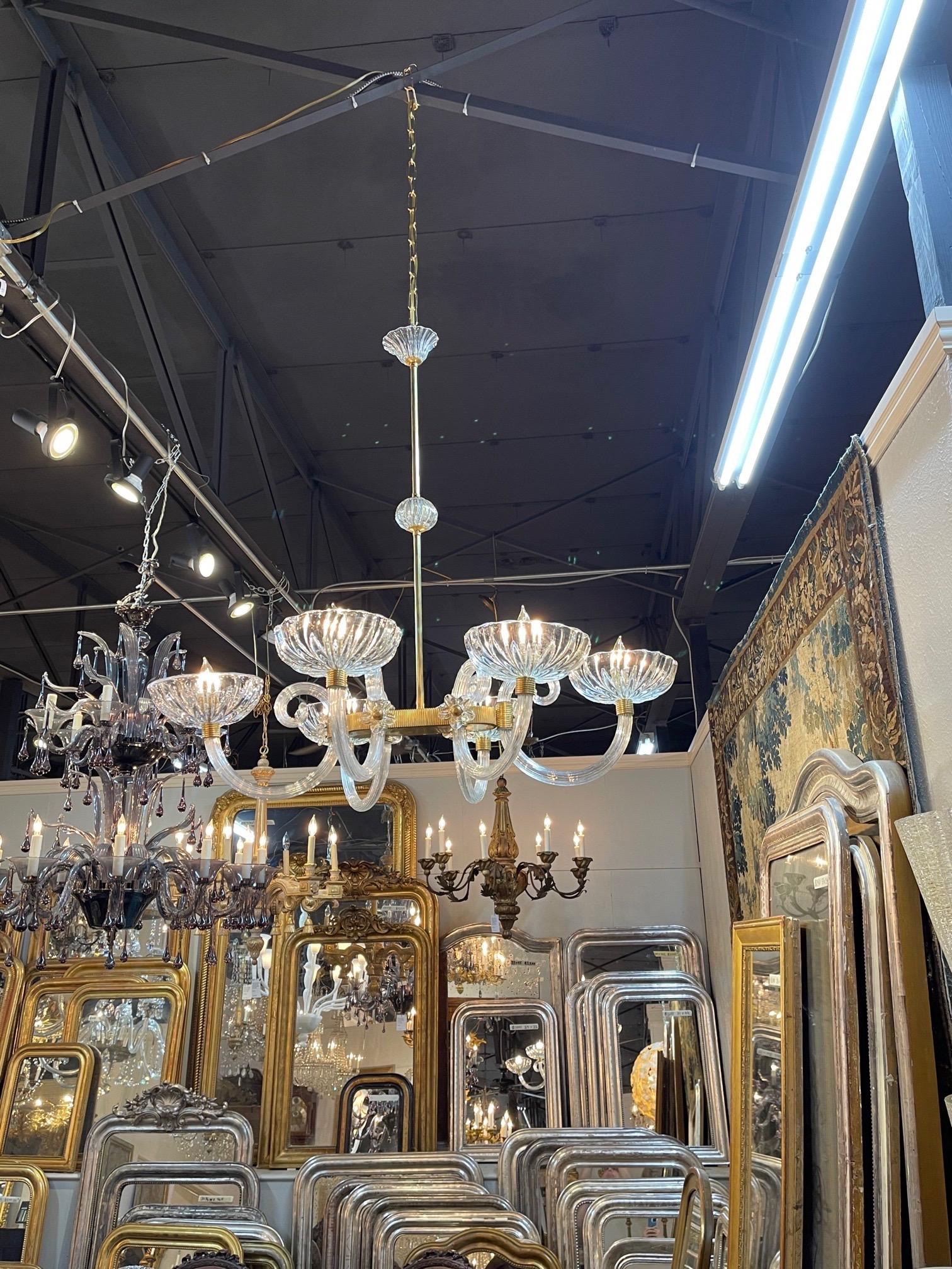 Fabulous vintage Italian glass and brass 6 light chandelier by Barovier and Toso. Sparkling glass and gorgeous brass create a very polished look. Stunning!