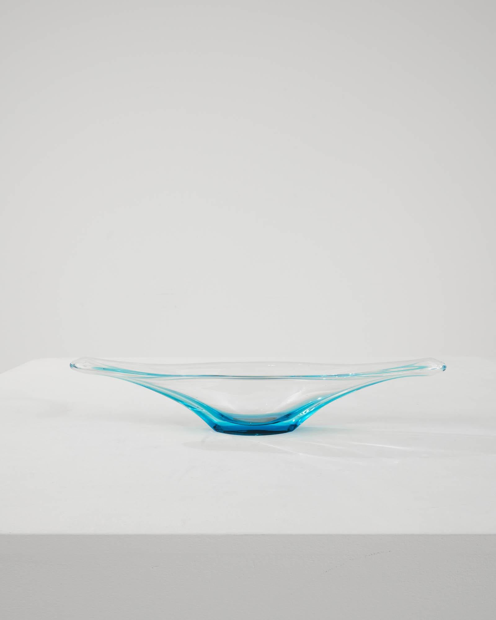 The vivid hues and liquid lines of blown art glass create an unmissable accent. Made in Italy circa 1960, expressive glasswork forms a bold silhouette. Organic and abstract, reminiscent of a water droplet captured in slow motion. A luminous gradient