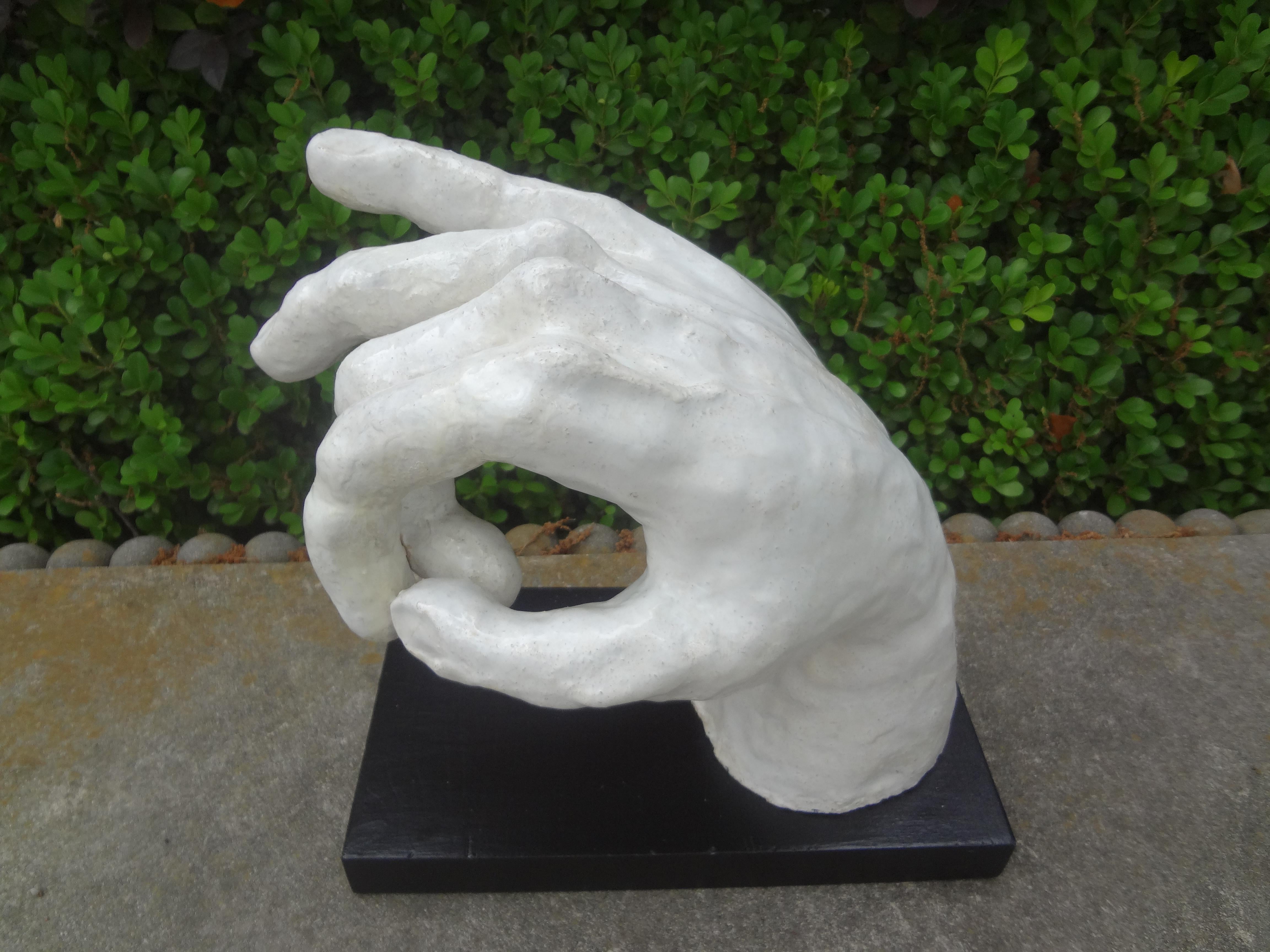 Vintage Italian Glazed Terra cotta hand sculpture.
This interesting 20th century Italian Hollywood Regency glazed terracotta hand sculpture is expertly created and mounted on an ebonized wood base.
Great coffee table or bookcase accessory!