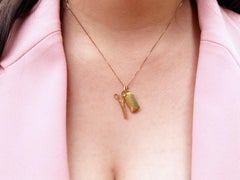 Colgante vintage italiano con forma de tijeras articuladas de oro, 18K