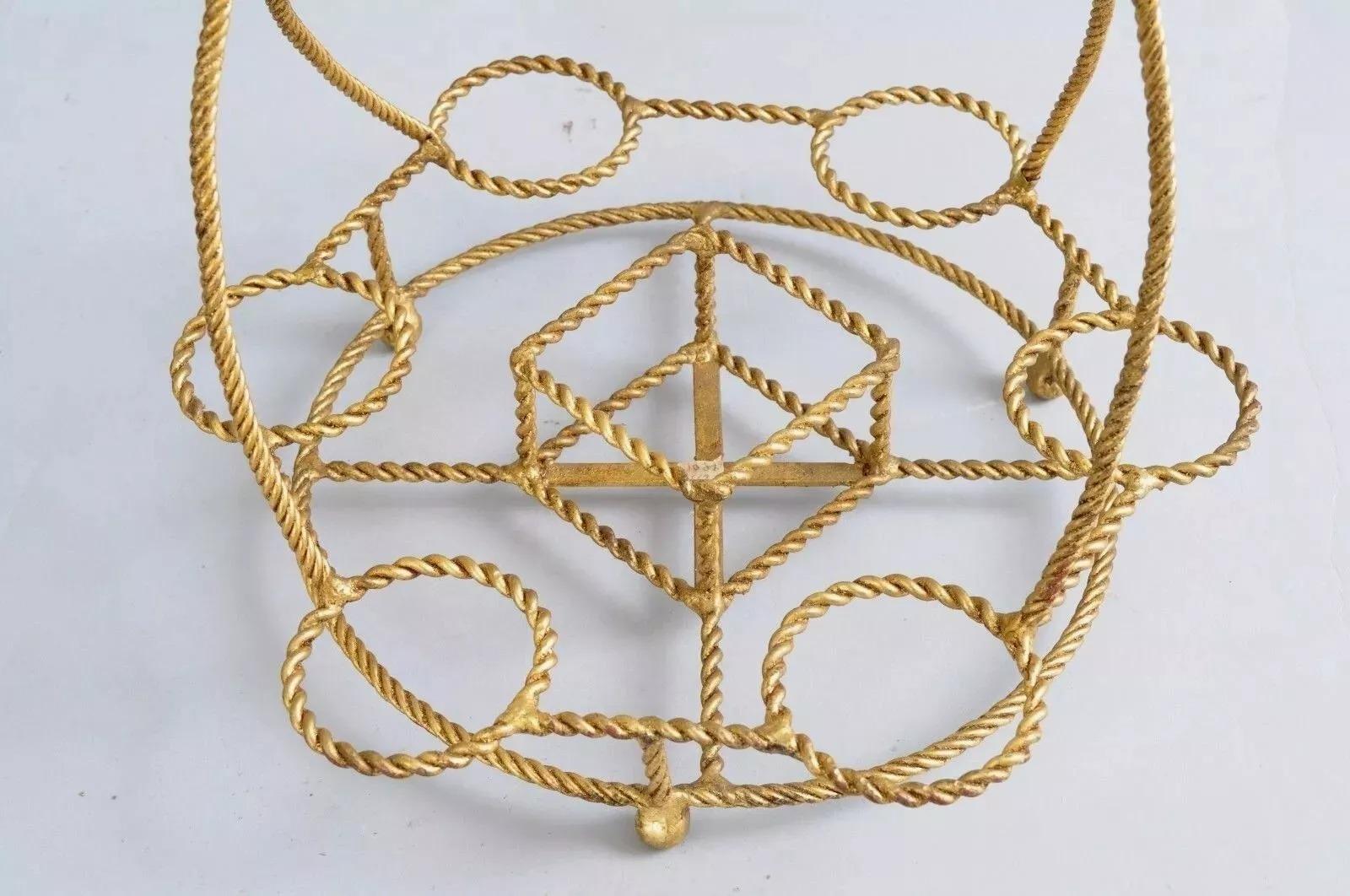 Vintage Italian Gold Gilt Iron Rope Hollywood Regency Bar Table Liquor Caddy (A). Item features a gold gilt iron frame, rope twisted design, 6 round glass holders, 1 square bottle holder in the center, raised on 3 ball form feet, Original 