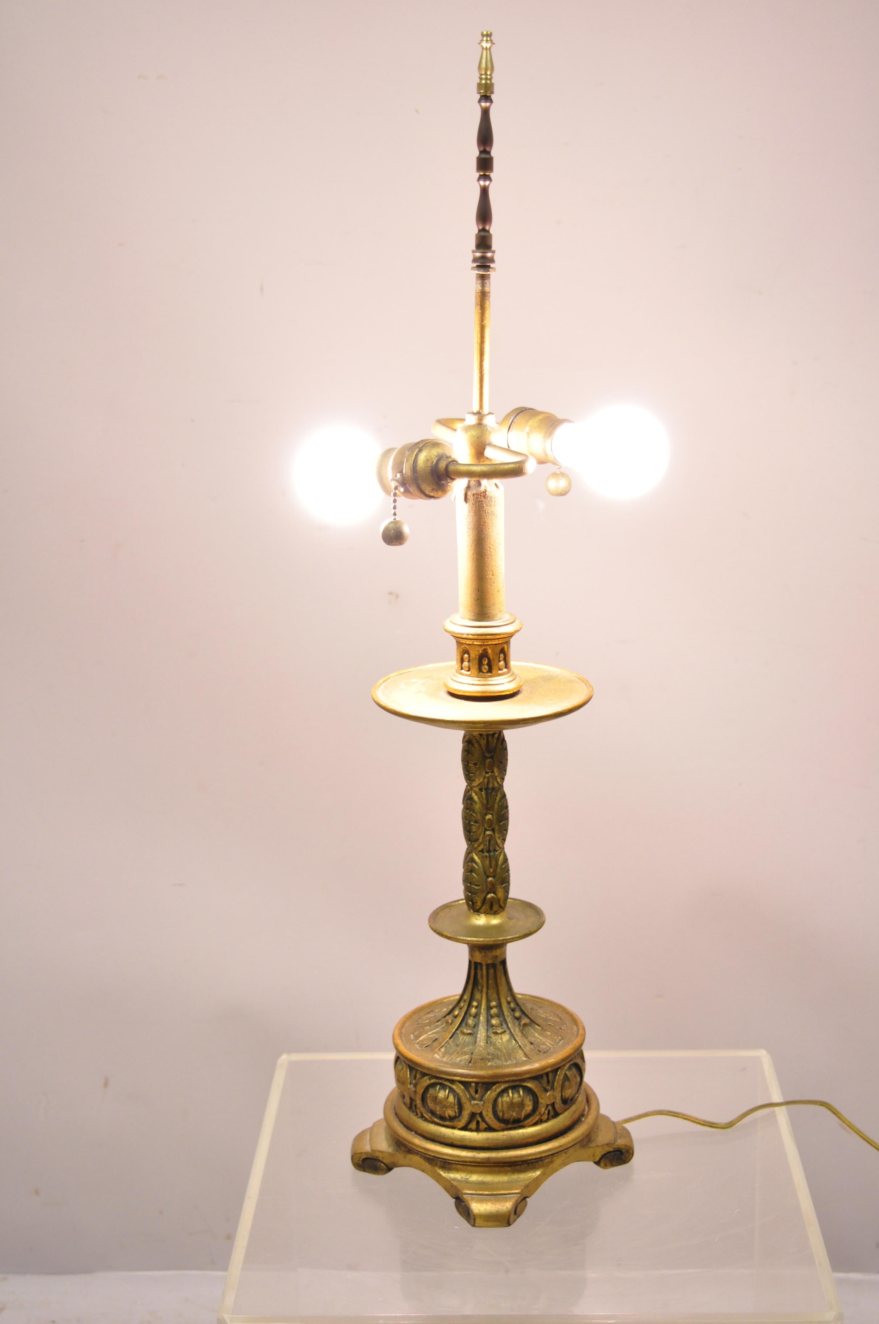 Vintage Italian gold giltwood carved candle candelabrum Florentine table lamp. Item features 2 light sockets, solid wood construction, gold distressed finish, nicely carved details, very nice antique item, circa early to mid-1900s. Measurements: