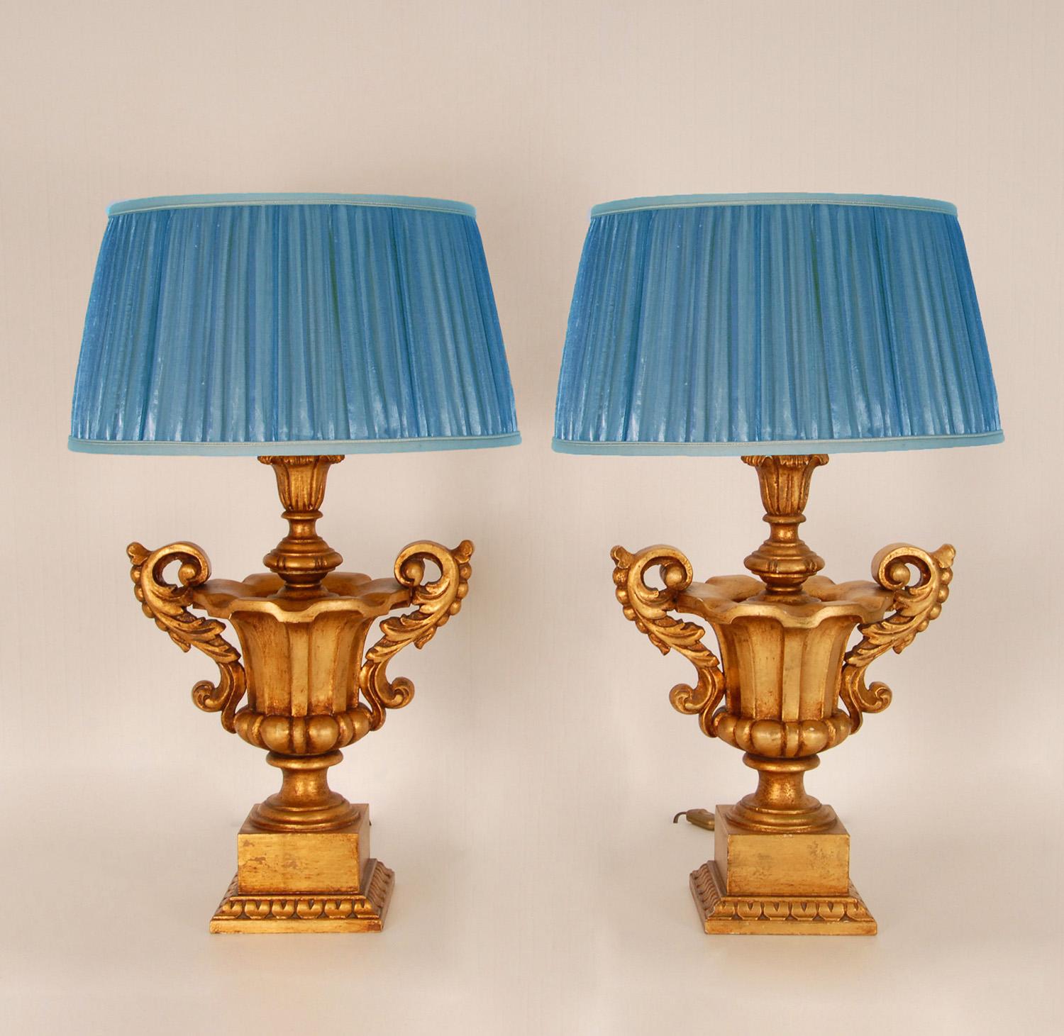 Vintage Italian Giltwood Lamps hand carved altar urn vases table lamps
Style: Vintage, Baroque, Antique, Mid Century, Neoclassical
Material: wood, gold leaf
Description: Beautifully gold giltwood Baroque style urns table lamps.
The vases with a