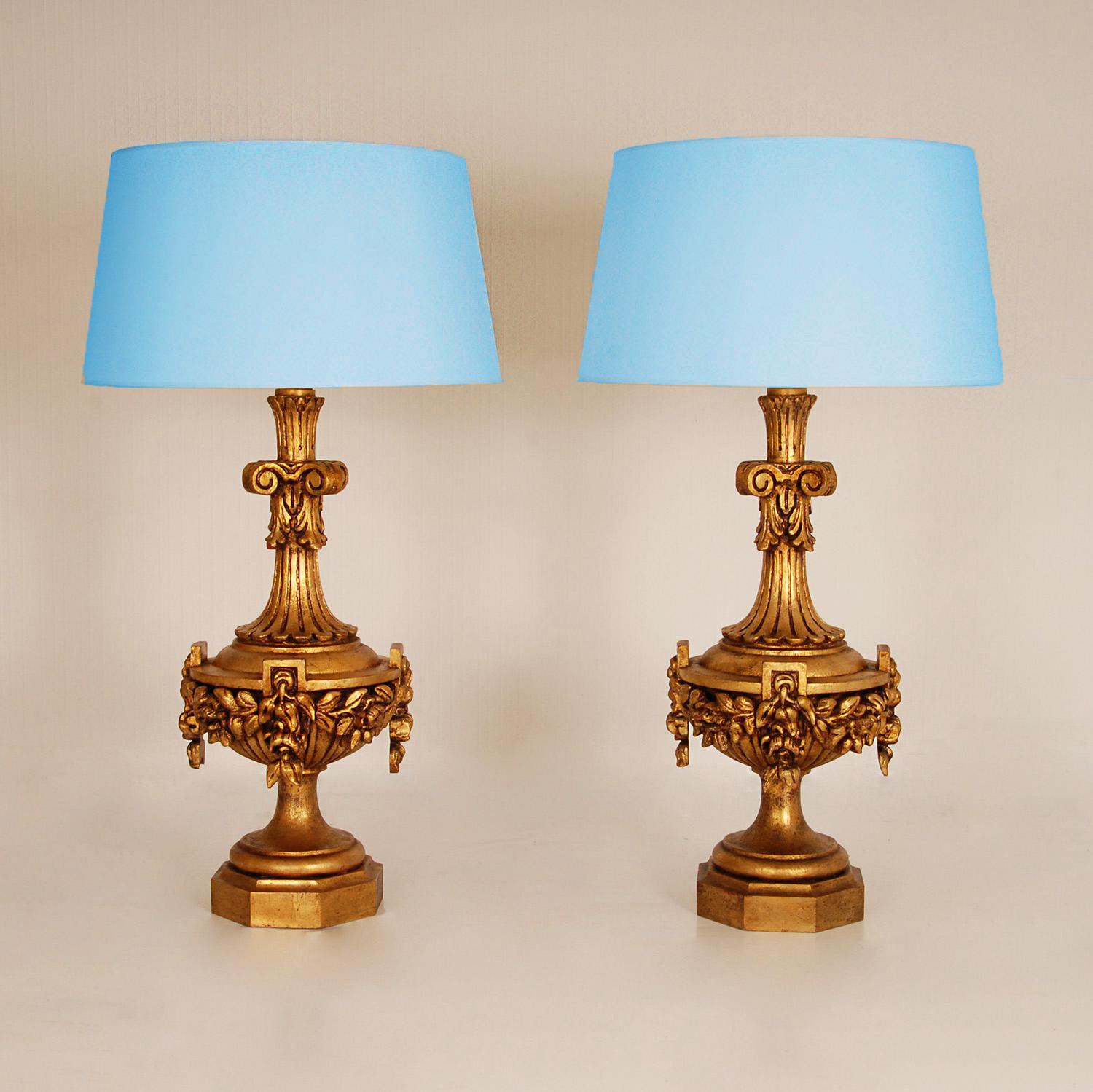 Vintage tall ornamental Italian Giltwood Lamps hand carved Neoclassical table lamps with lampshades.
Style: Vintage, Italian, French Country, French Provincial, Baroque, Antique, Mid Century, Neoclassical, Regency, Art deco
Material: wood, gold