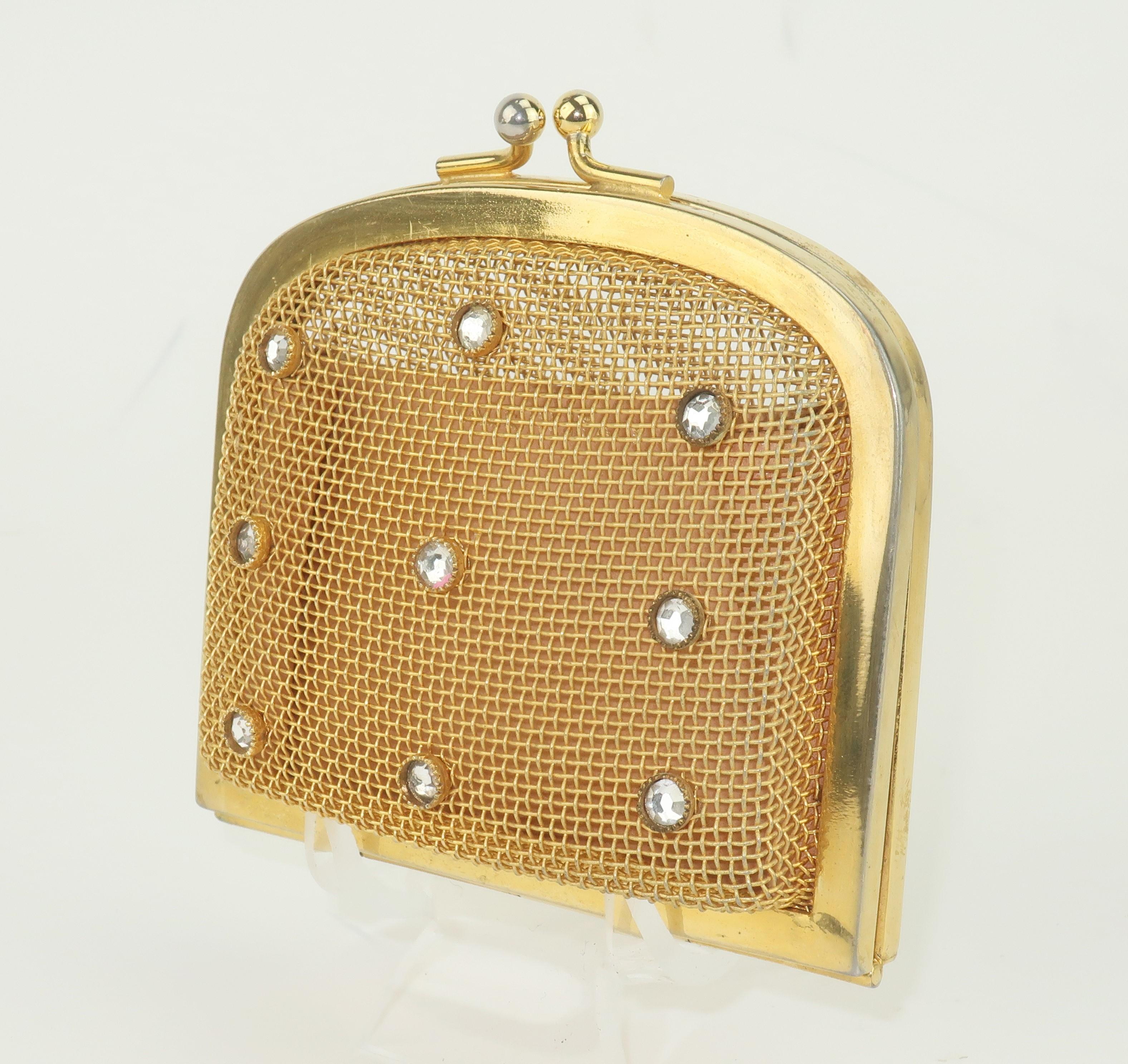 C.1980 Italian gold mesh change purse with leather divider and crystal rhinestone accents.  A fun little accessory for your favorite handbag.  Please see the Modern & Moore homepage for the red leather Valentino handbag shown as display in