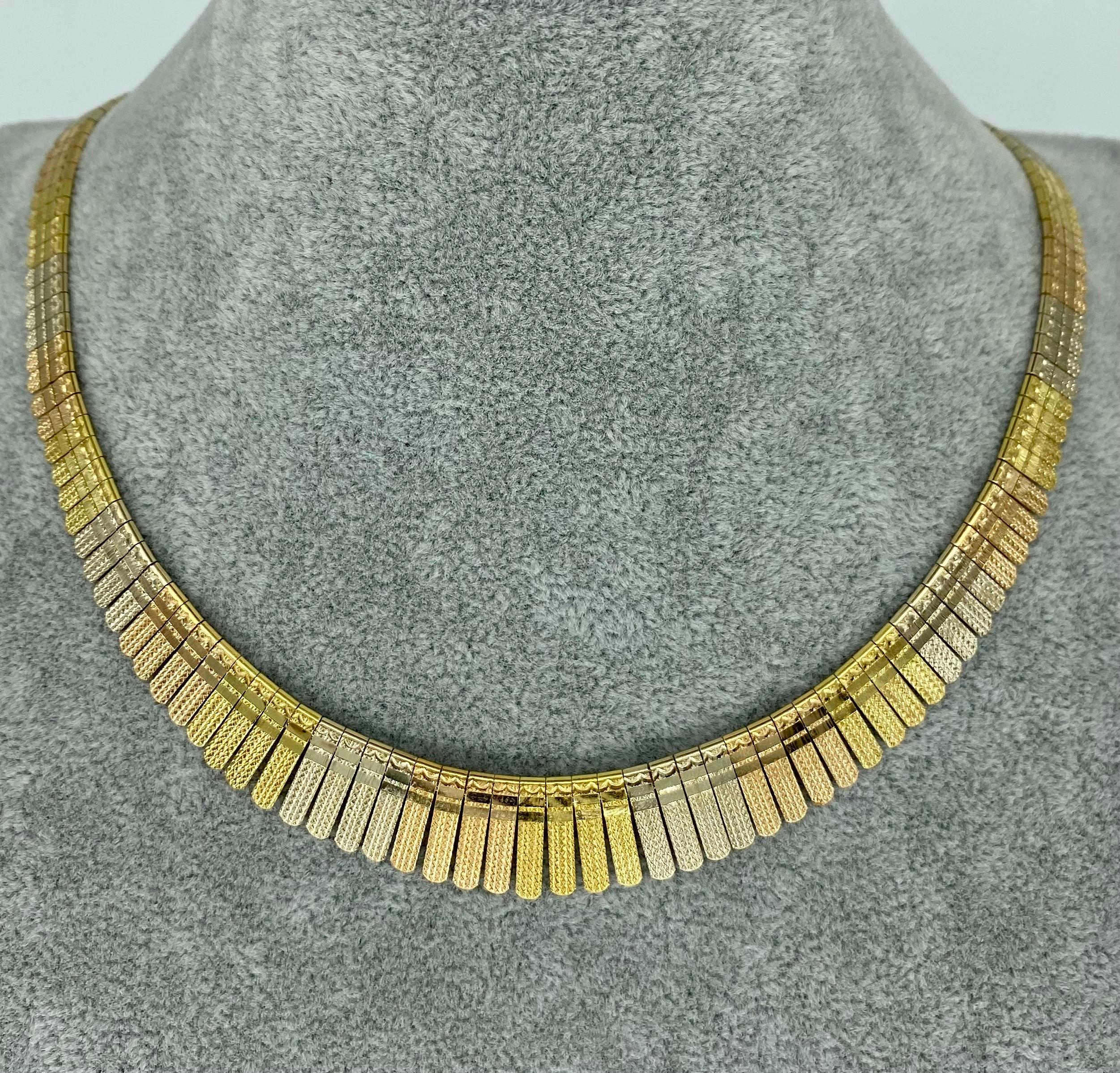 Vintage Italian Graduating Cleopatra Diamond Cut Tri-Color Gold Choker 18k Gold. Beautiful and shiny tri color gold featuring yellow gold, rose gold and white gold. The choker features fancy cleopatra style with diamond cuts accents throughout.