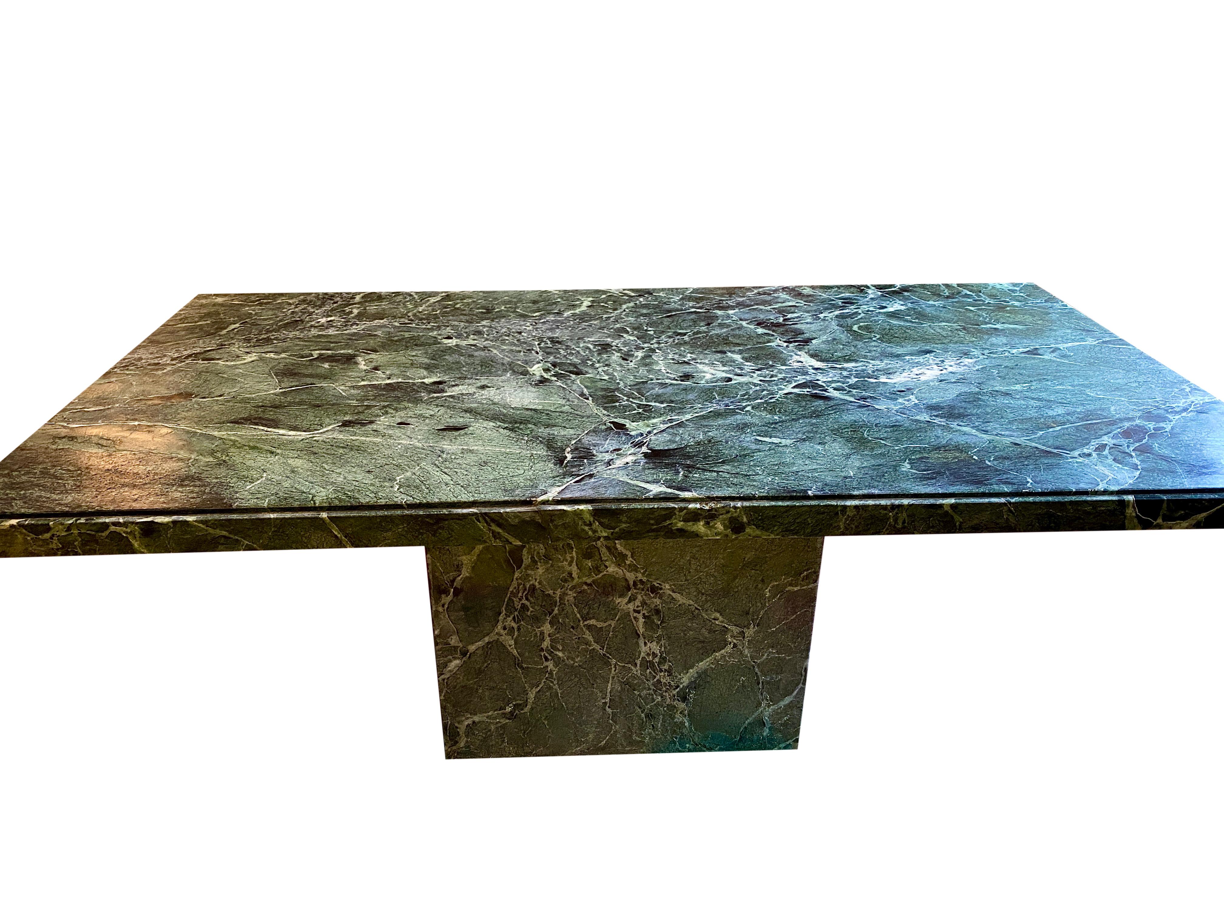 Stunning vintage Italian green marble dining table, made in Italy, circa the 1980s. In excellent vintage condition. Solid marble rectangular base. The solid marble top is 3