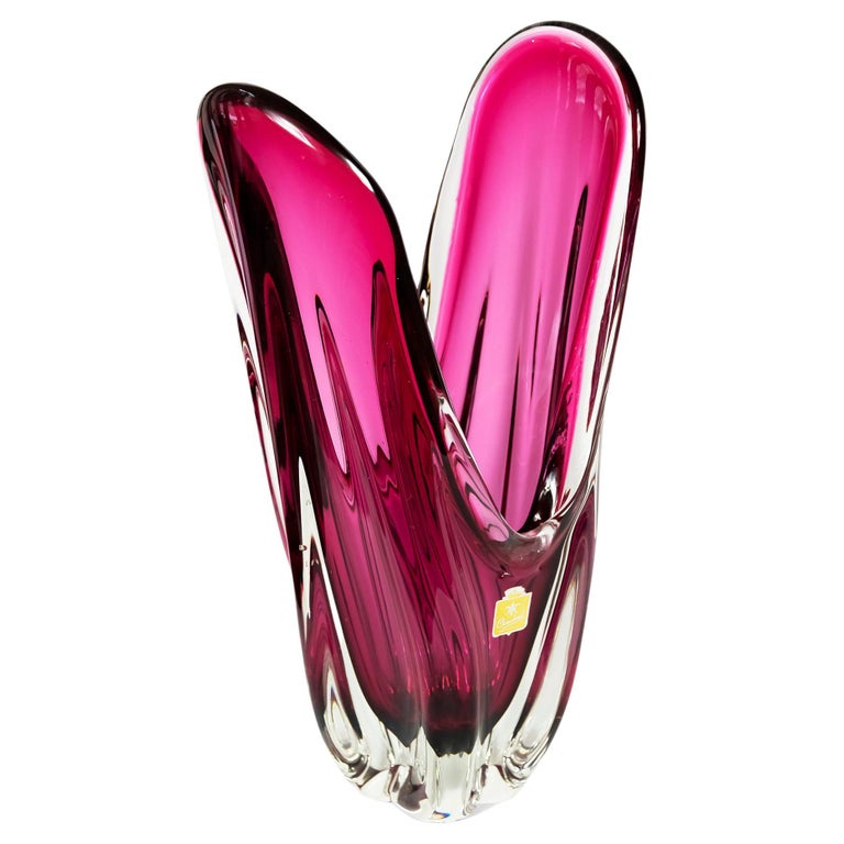 Large Italian Murano glass vase is handmade by Chambord (probably by Fratelli Toso) and created in asymmetric shape in intense fuchsia pink colour.
The vase is heavy and solid.
Weight is 8,7 kg.
Labeled Chambord Made in Italy.