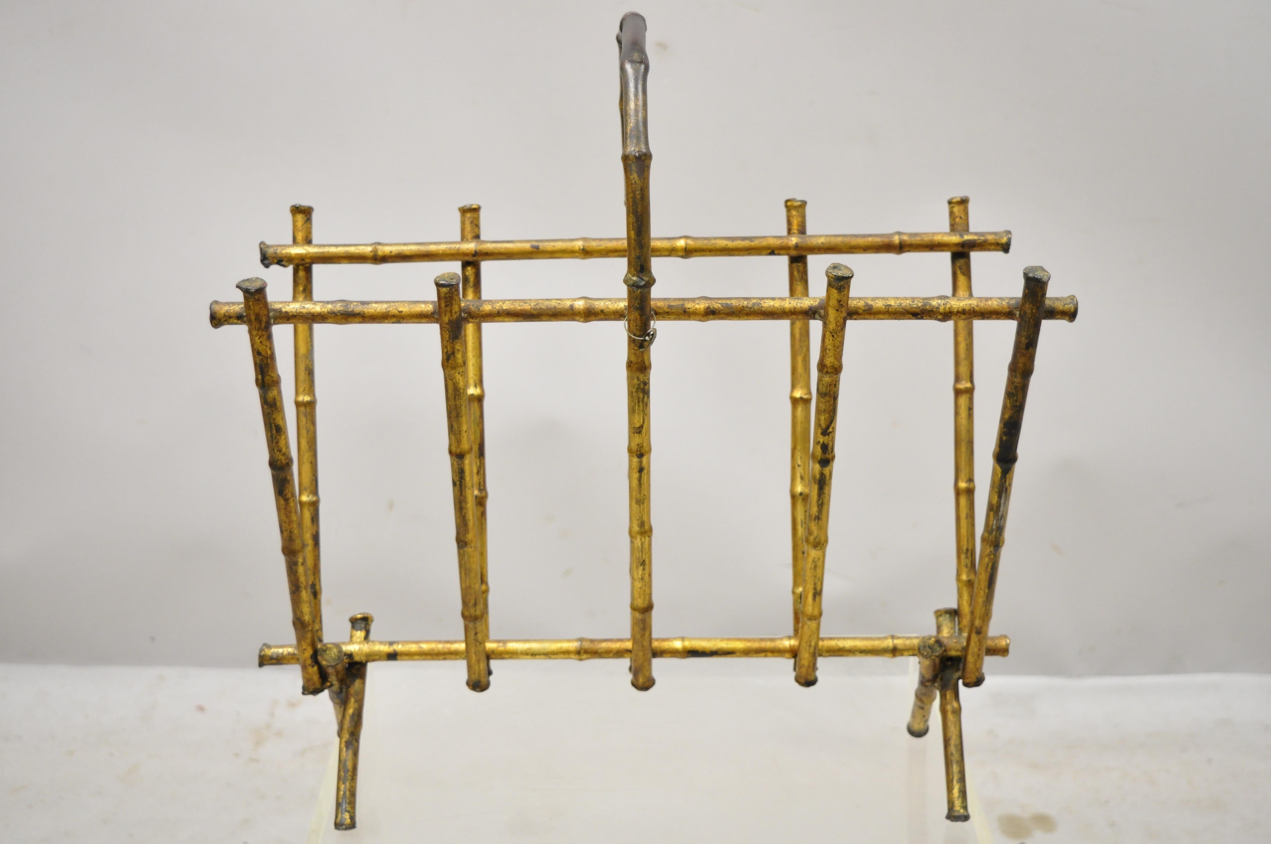Vintage Italian Hollywood Regency faux bamboo gold gilt metal tole magazine rack stand, circa early to mid-20th century. Measurements: 18.5