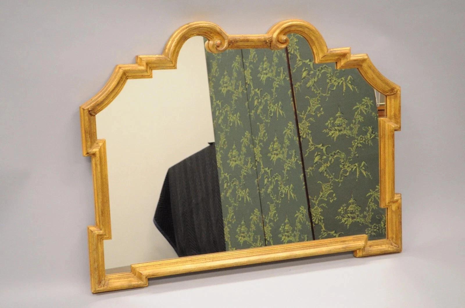 Vintage Italian Hollywood Regency Gold Gilt Carved Wood 32 x 40 Wall Mirror. Circa Mid 20th Century. Measurements: 32