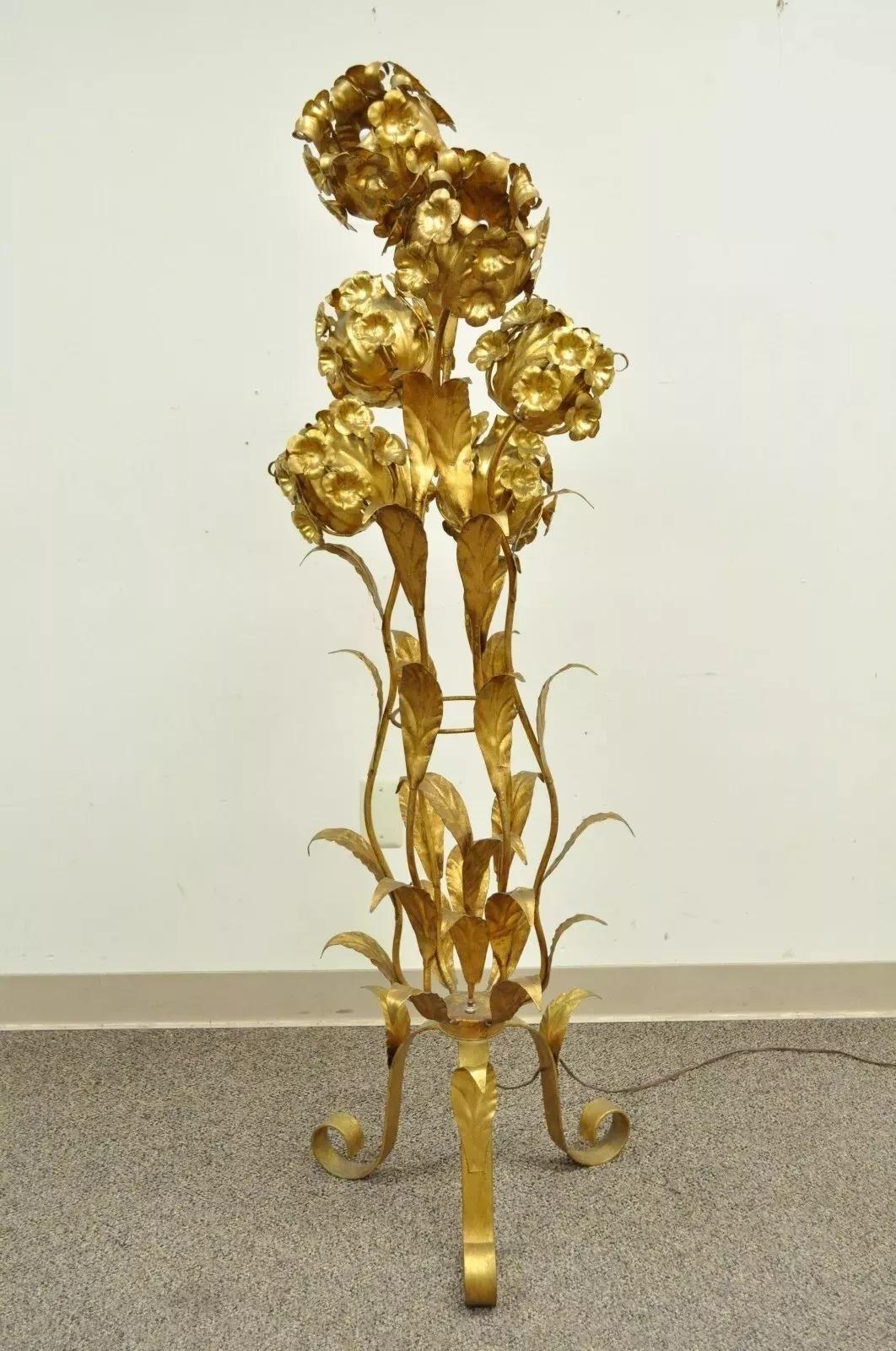 Vintage Italian Hollywood Regency Gold Gilt Floral Tole Metal 6 Light Floor Lamp. Item features 6 lights in a bulbous floral setting, scrolling legs, gold leaf finish, 3 way Lights. Circa Mid 20th Century. Measurements: 57