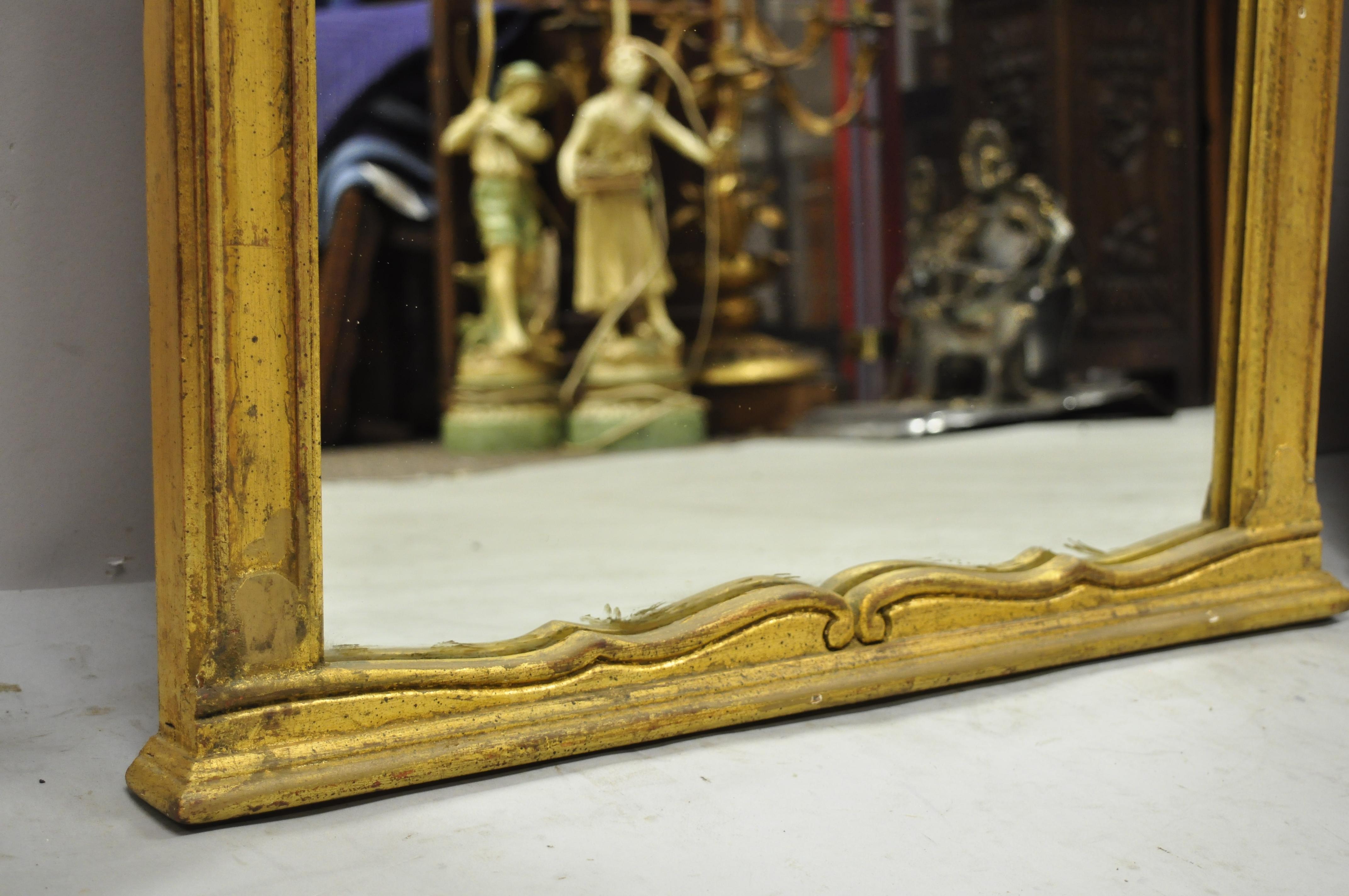 20ième siècle Paire de miroirs muraux Trumeau italiens vintage Hollywood Regency en bois doré et doré en vente