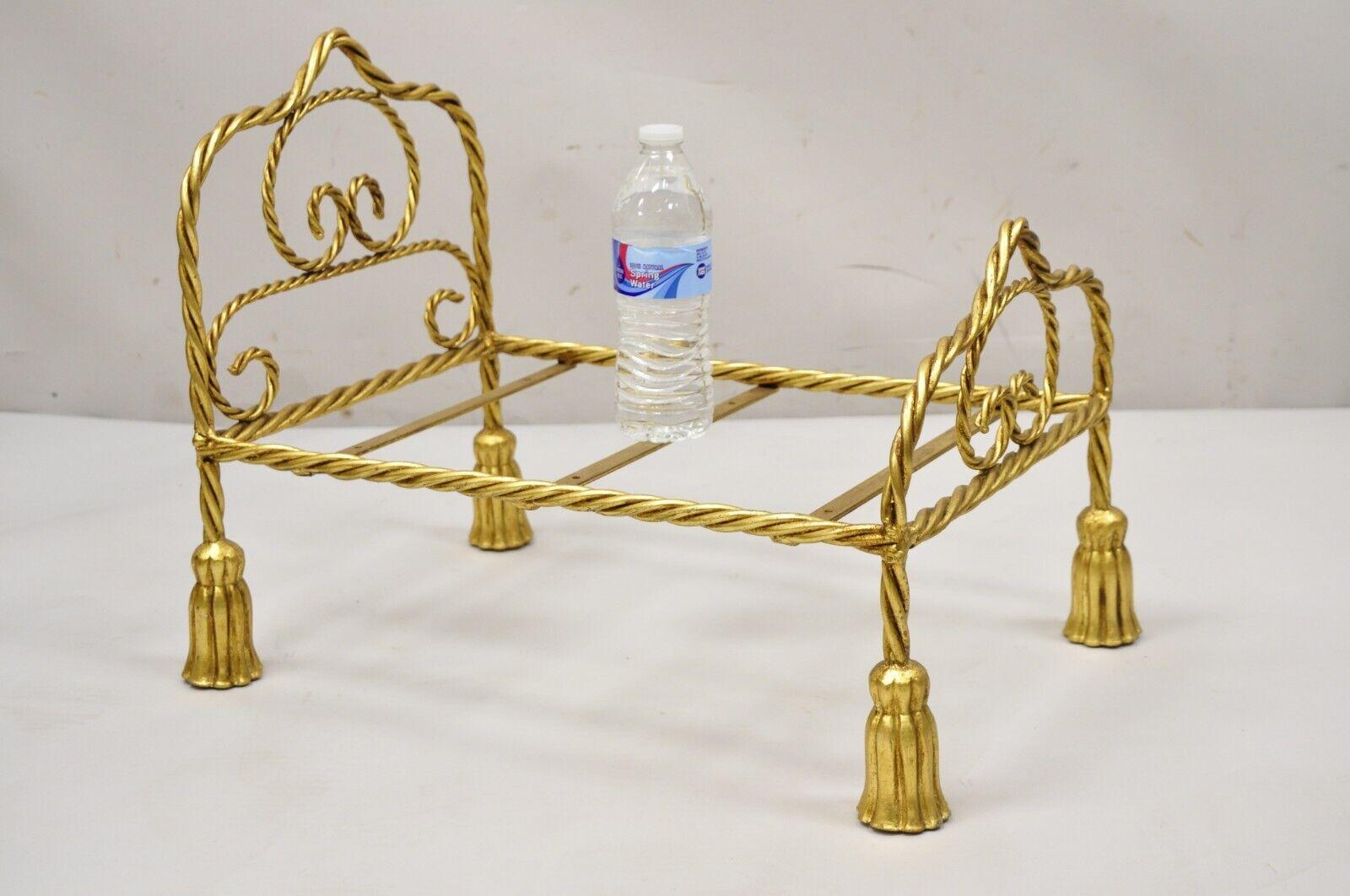 Vintage Italian Hollywood Regency Iron Tassel Frame Pet Cat Dog Bed or Doll Bed. Item featured is a nice size for small pets or doll display, gold leaf gilt finish, iron metal scrolling frame, tassel form feet, very nice vintage item, quality