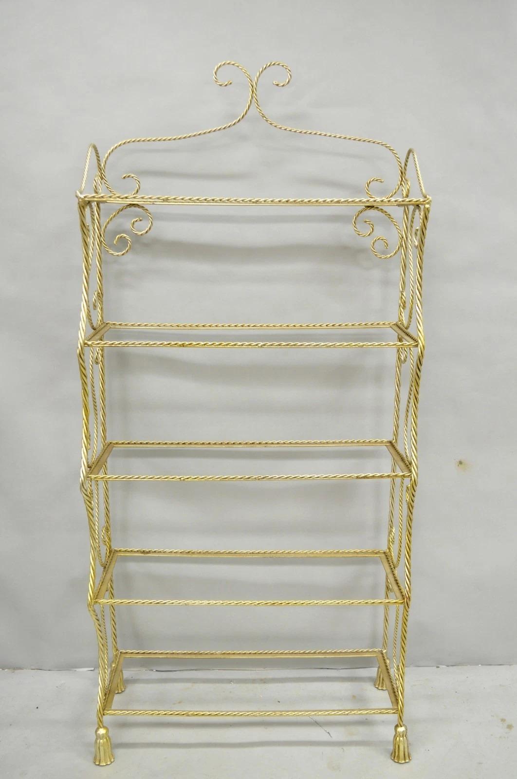 Bitte teilen Sie uns Ihre Postleitzahl mit, um ein günstigeres Angebot für den Versand innerhalb der USA anzufordern.

Vintage Italian Hollywood Regency Silber/Gold vergoldetes Eisen Seil & Tassel 5 Tier Etagere (Glasböden nicht enthalten). CIRCA