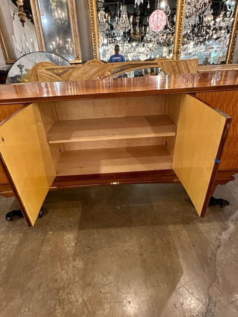 Fabulous vintage Italian large scale breakfront display cabinet. Very fine quality. The piece is lined with linen and has lighting. Beautiful!!