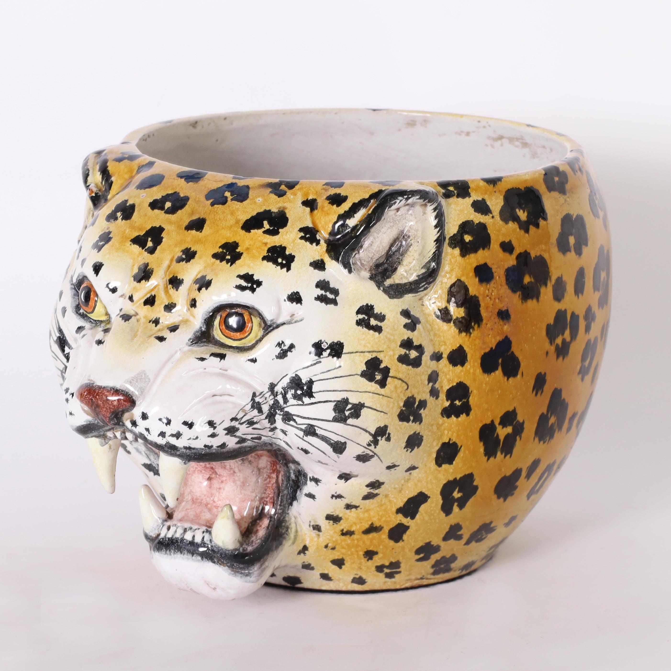 Unusual mid century Italian bowl crafted in terra cotta with a snarling leopard head hand decorated and glazed. 