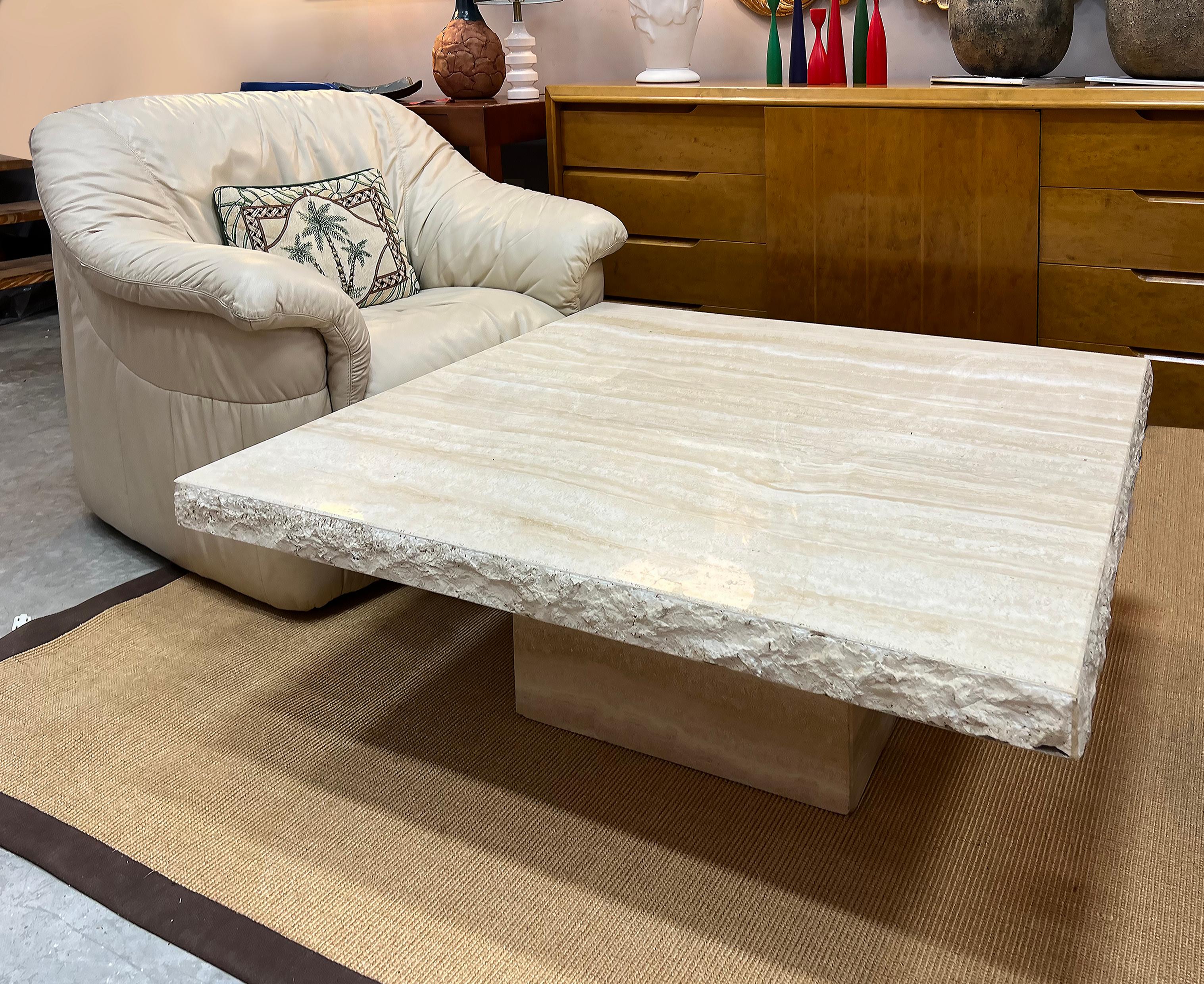 Vintage Postmodern Live Edge Travertine Stone Coffee Table  

Offered for sale is a substantial square circa 1980s Italian travertine coffee table with live-edge finished ends. The thick travertine stone top is beautifully grained and separates from