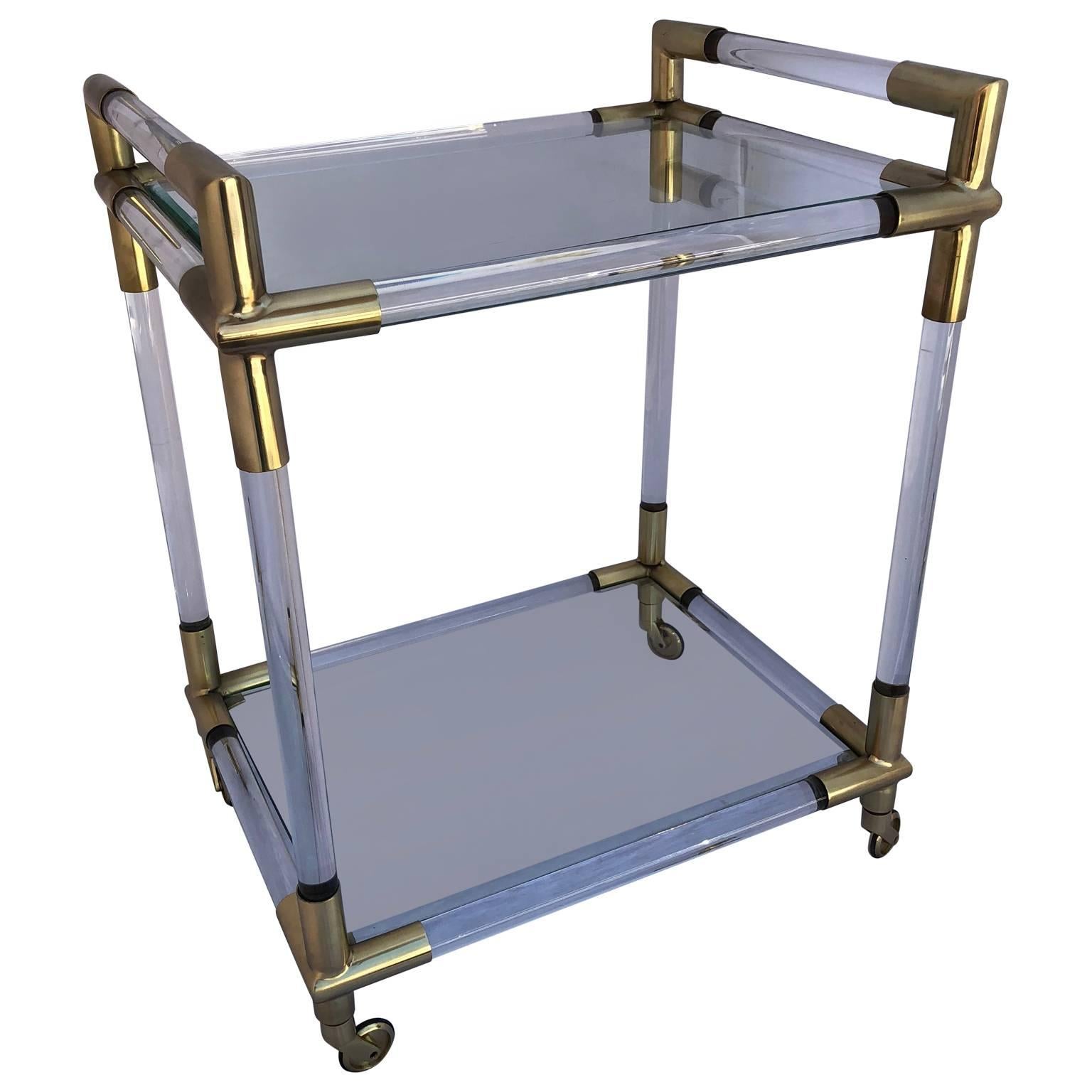 Amazing vintage Italian glass and brass bar cart in the style of Hollis Jones
The two glass shelves have handcrafted bevelled edges, see included image.
Optional 8-12 hour Tri-State & DC snap delivery can be accommodated

$125 flat rate front door