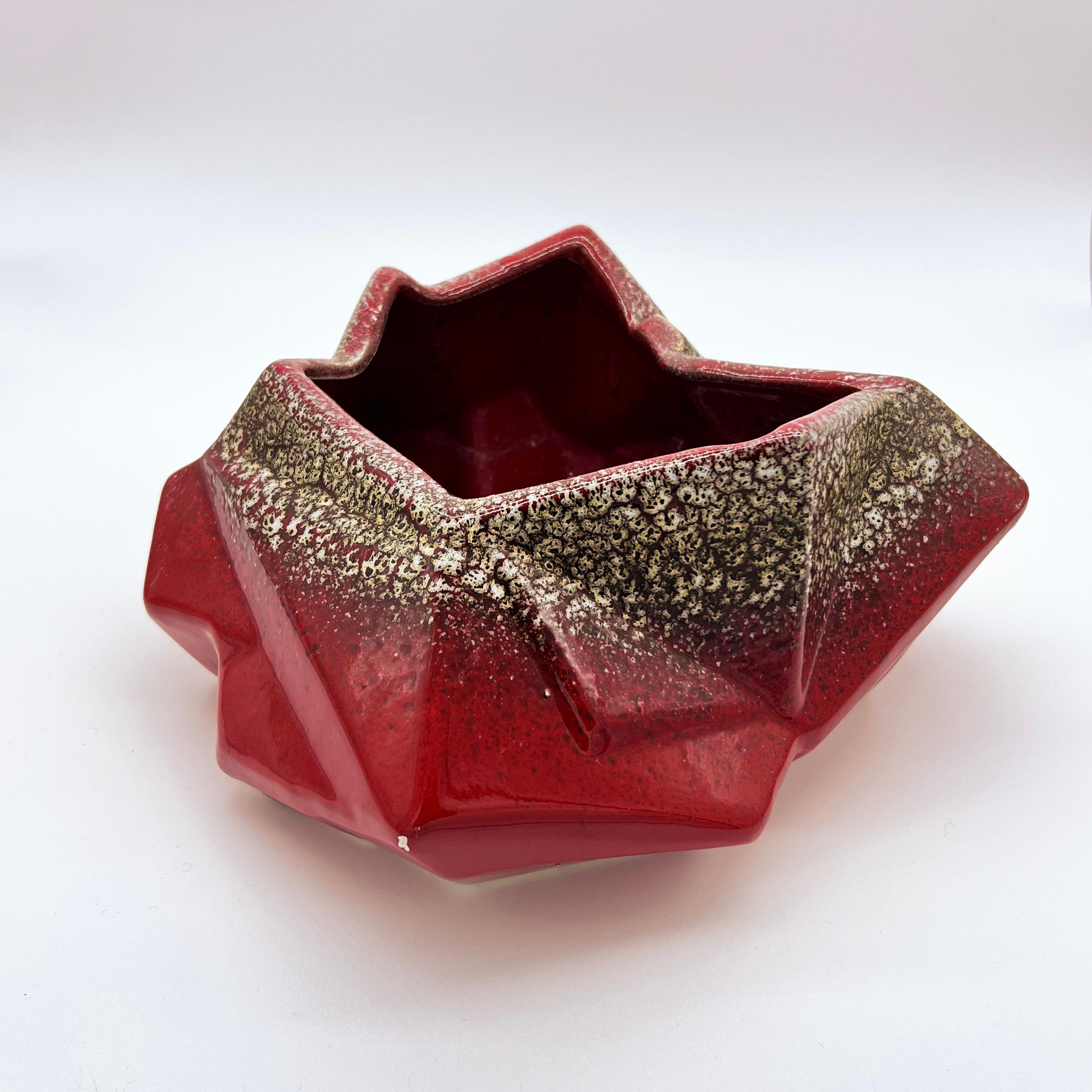 Vintage red ceramic bowl - valet tray, made in Italy in the 1970s with an abstract geometric shape. Hand painted, with a deep red base layer and a series of decorative 