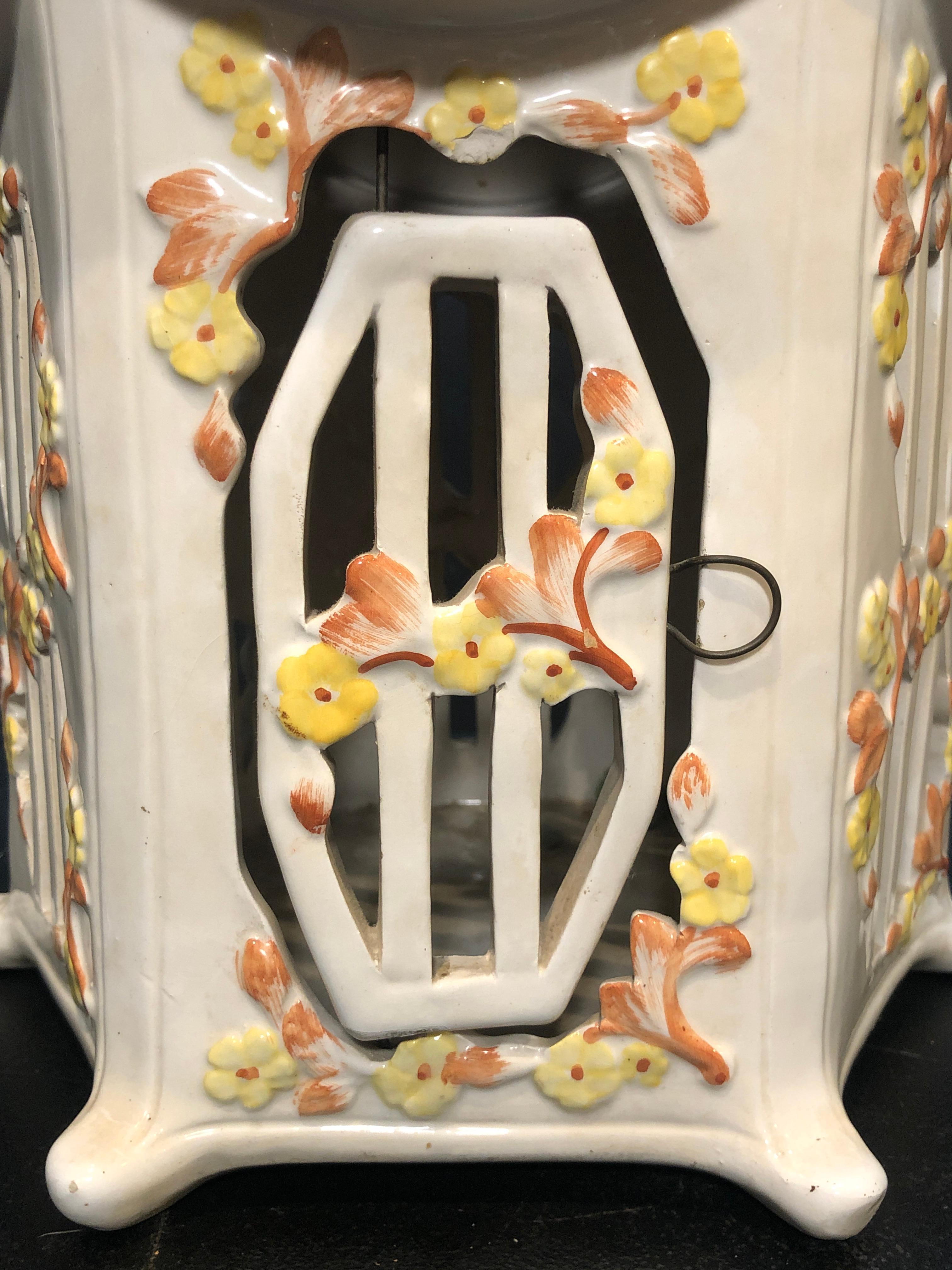 Vintage Italian Majolica Porcelain birdcage glazed ceramic. Pagoda form in white with terracotta colored roof and yellow flowers. Could also be wired for a chandelier.