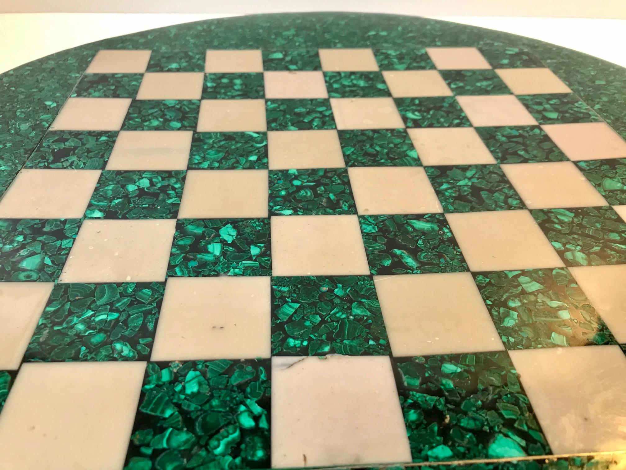 A circular chess board fashioned from malachite and bone Marple. Manufactured in Italy during the 1960s or 1970s.