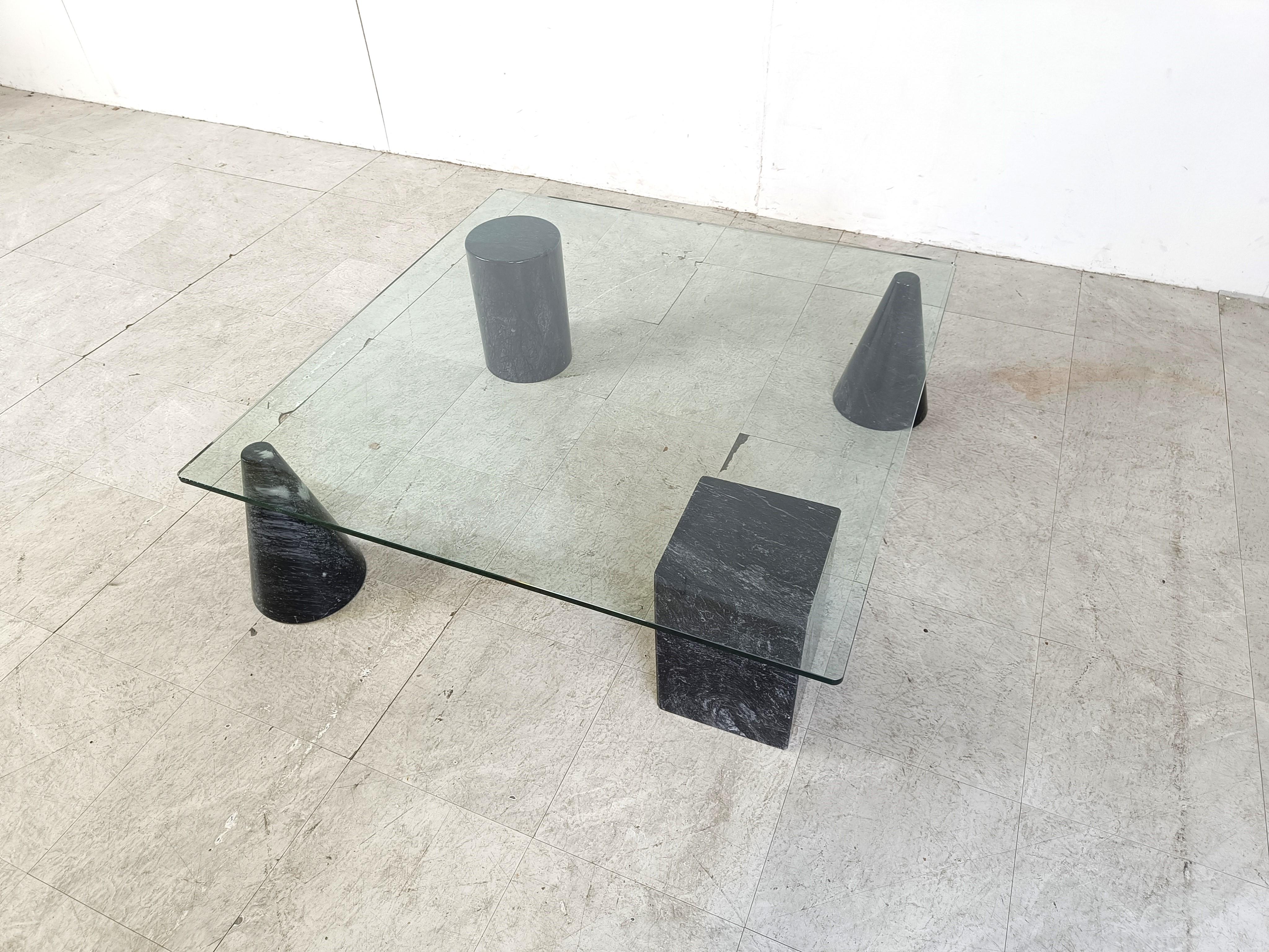 Coffee Table with a clear glass top and Geometric solid Marble Shapes in the style of ‘Metafora’ by Lella and Massimo Vignelli.

Beautiful vained marble.

Timeless design.

Very good condition.

1970s - Italy

Dimensions:
Height: 32cm/15.59