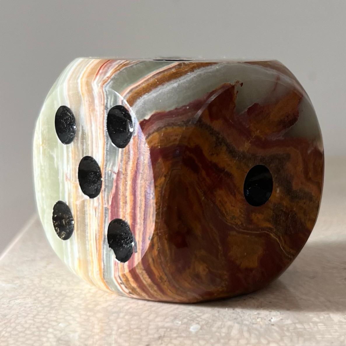 A vintage hand-carved “die” (dice) objet d’art / paperweight, hand-carved from onyx in Italy circa early 1960s. Tones of pistachio, rust, and eggshell. A unique and rare memento of marble art work that was flourishing in the mid 20th century Italy. 
