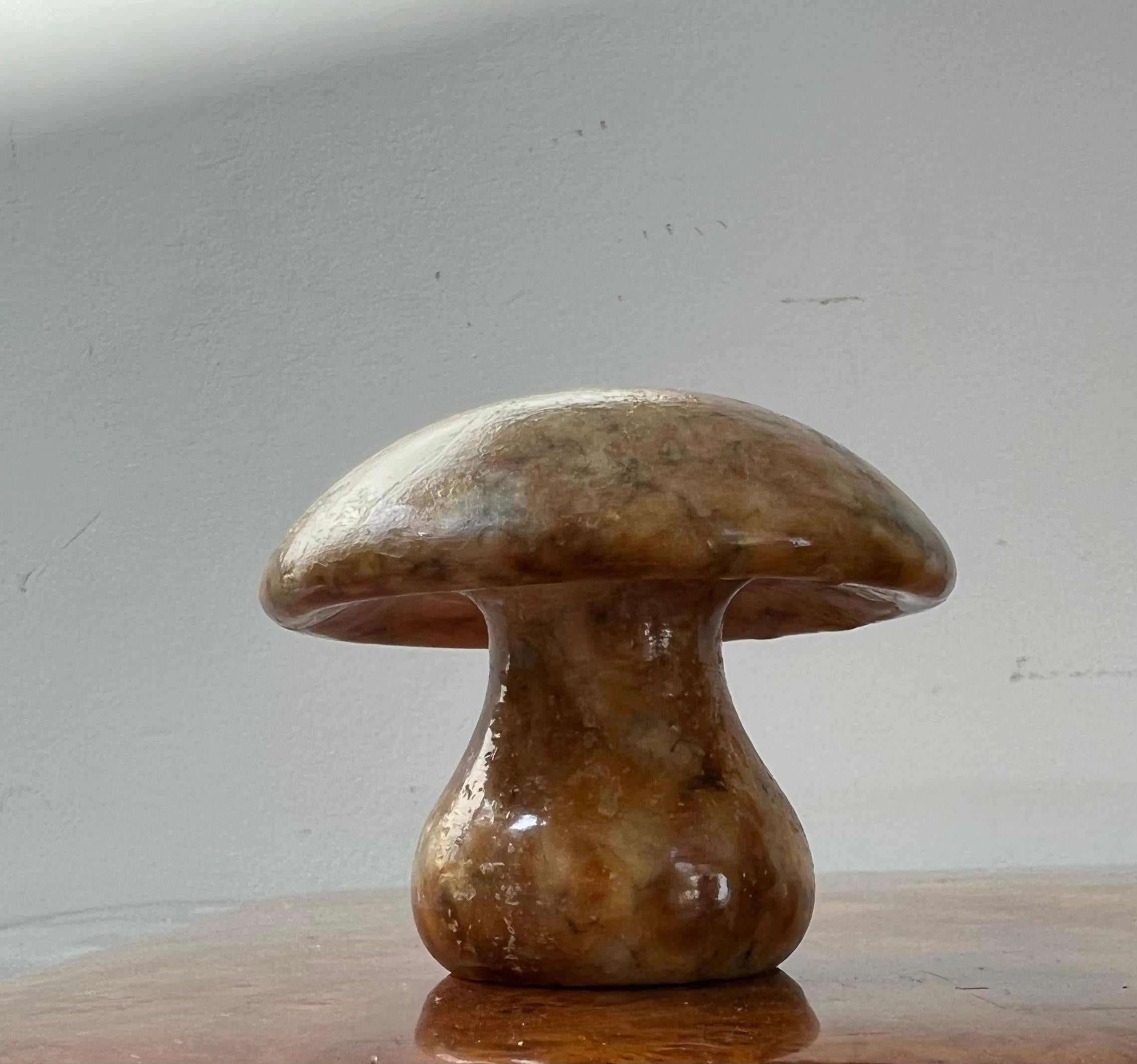 A vintage Italian marble alabaster mushroom, circa 1960s. Hand-carved in Italy. Tones of ochre and caramel with ash veining. Minor signs of age as shown in photos. 