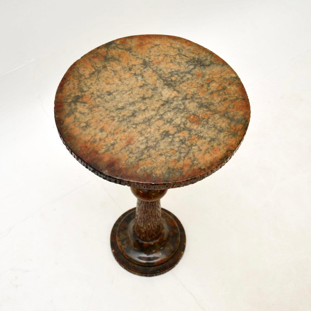 A gorgeous vintage Italian marble occasional side table, dating from around the 1960’s.

This is of lovely quality, it is crafted entirely from solid marble. It has a lovely shaped, with a textured edge to the circular top. The colour hues and