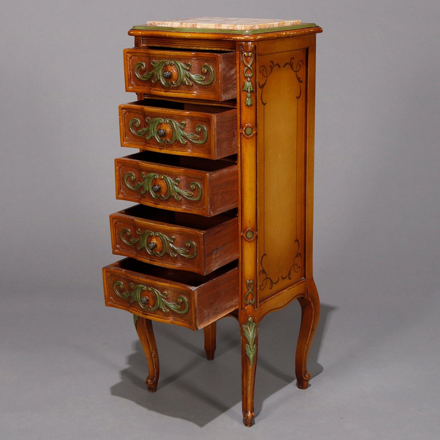 A vintage Italian lingerie chest offers marble top over maple case having five stacked drawers and paint decorated with scroll, foliate and acanthus elements, raised on cabriole legs terminating in stylized scroll form feet, c1940

***DELIVERY