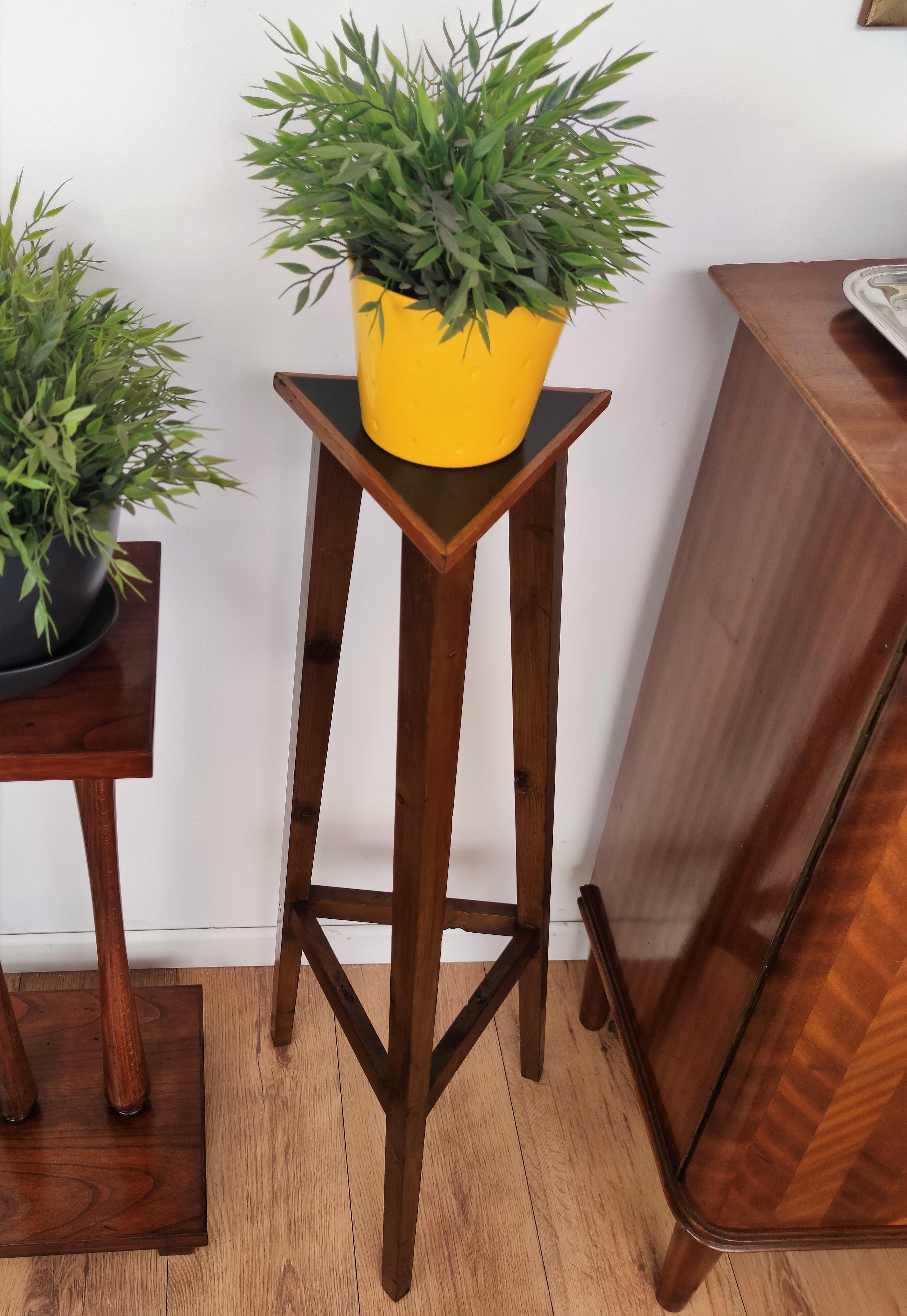 Beautiful Italian plant stand or pedestal ideal for various uses. The triangle top, black decorated, is supported on 3 legs in a typical mid-century Art Deco style. 
Dimensions are: Height cm 91 inch 35.8, top triangle sides are cm 25, inch 9.8