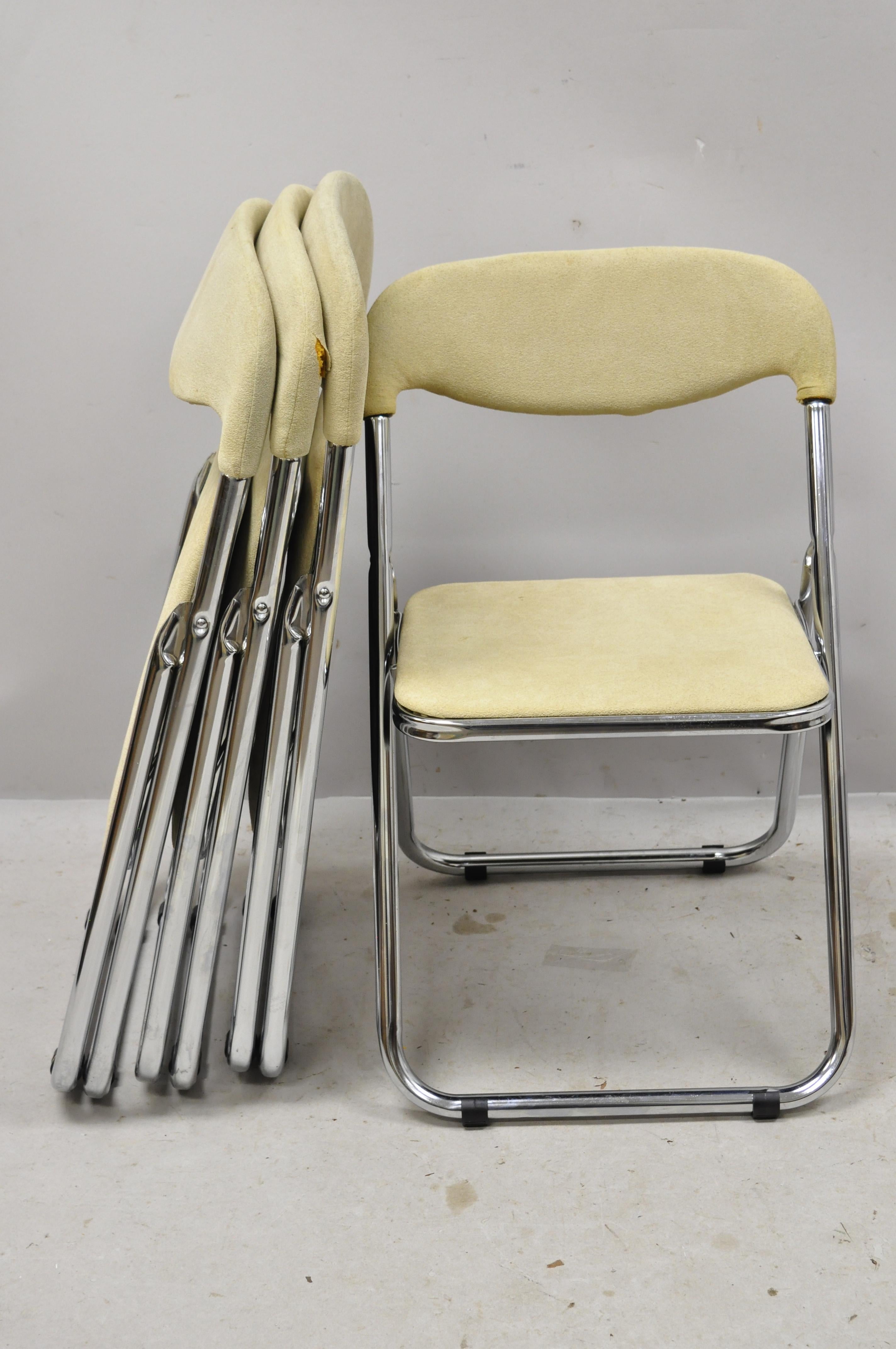 Vintage Italian Mid-Century Modern chrome upholstered folding game chairs, set of 4. Item features folding frames, chrome construction, original label, clean modernist lines, great style and form, circa mid-20th century. Measurements: Open: 25