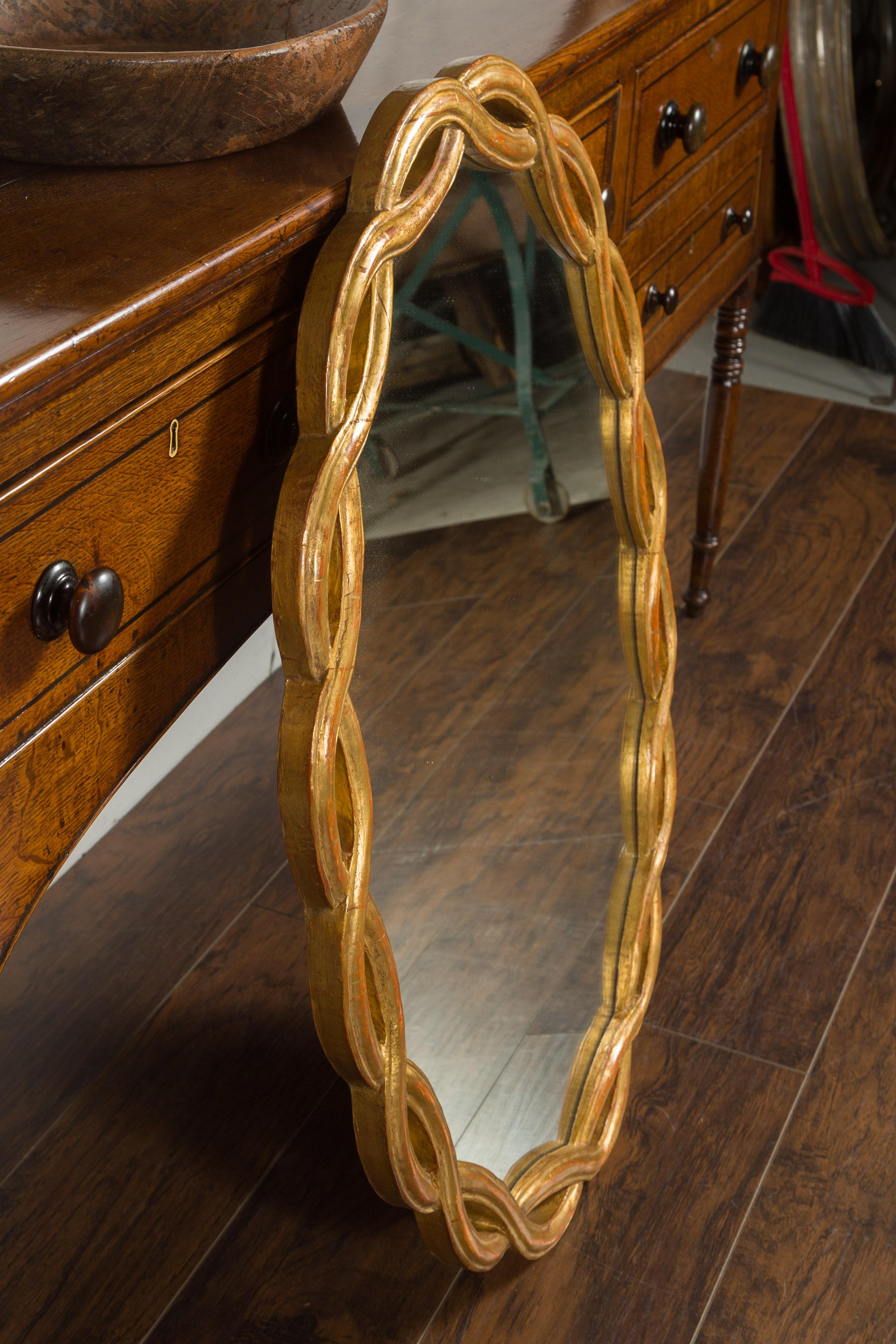 Vintage Italian Midcentury Giltwood Oval Mirror with Intertwining Motifs 6