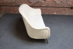 Vintage Italian Modern Curved Sofa on Brass Splayed Legs
