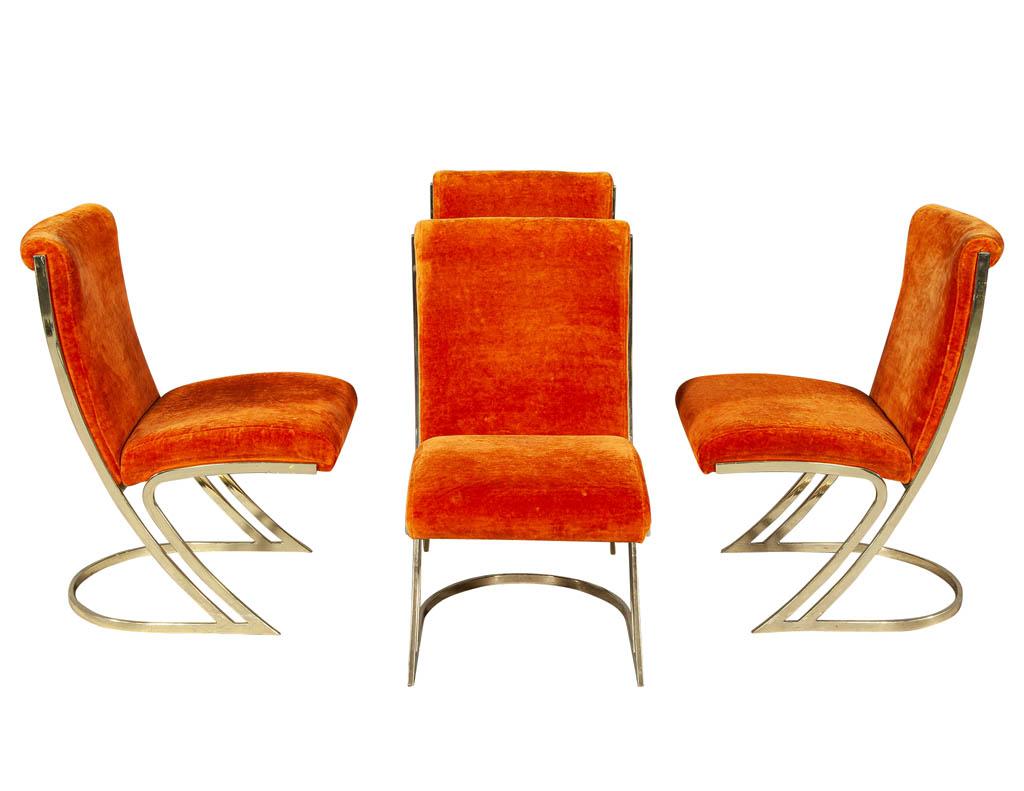 Vintage Italian modern dining chairs. Brass cantilever chairs in original orange velvet. All original, wear consistent with age and use.

Price includes complimentary scheduled curb side delivery service to the continental USA.
 