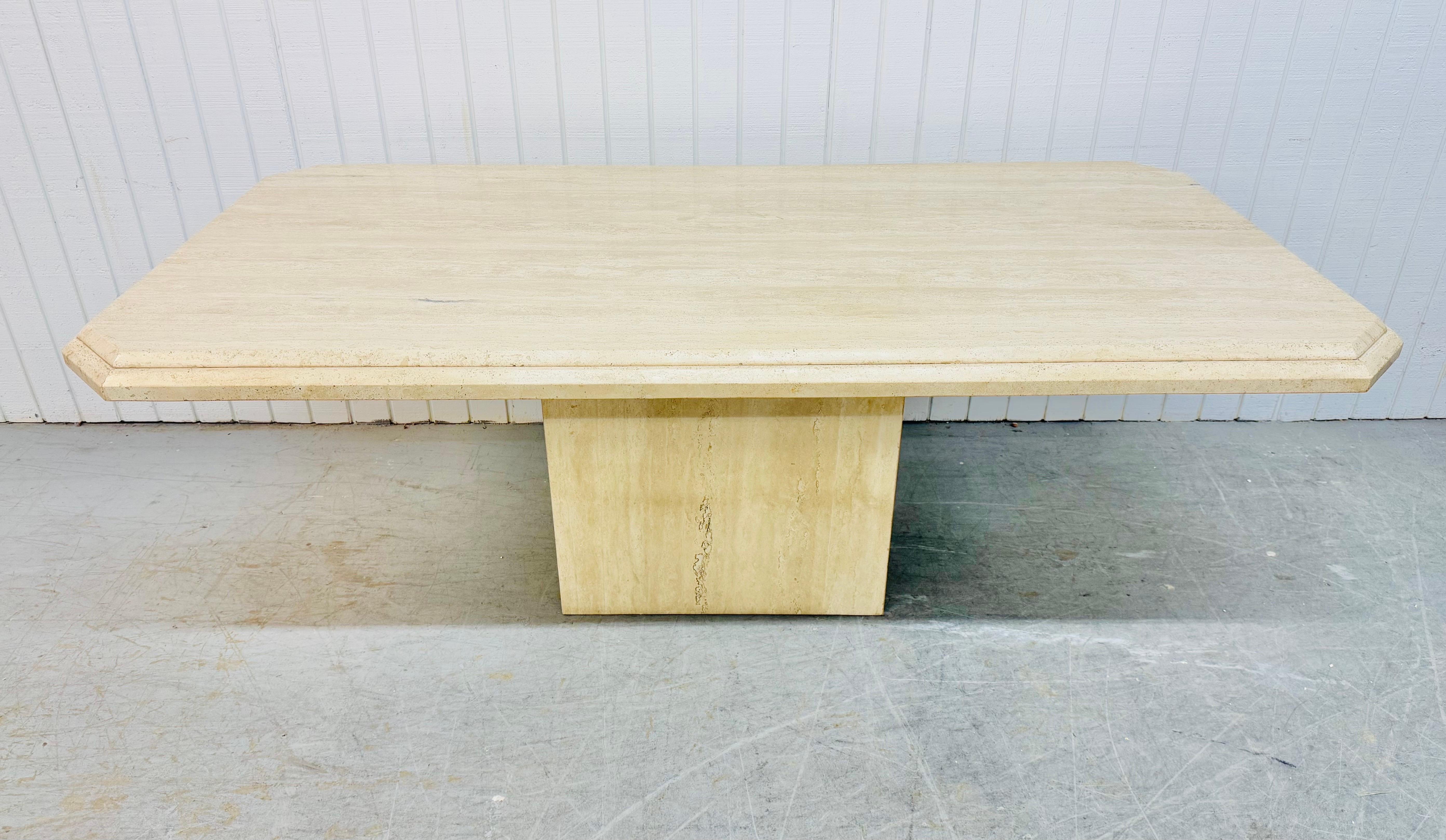 This listing is for a 1980’s Italian Modern Travertine Dining Table. Featuring a straight line design, removable travertine top, and pedestal base. This is an exceptional combination of quality and design!