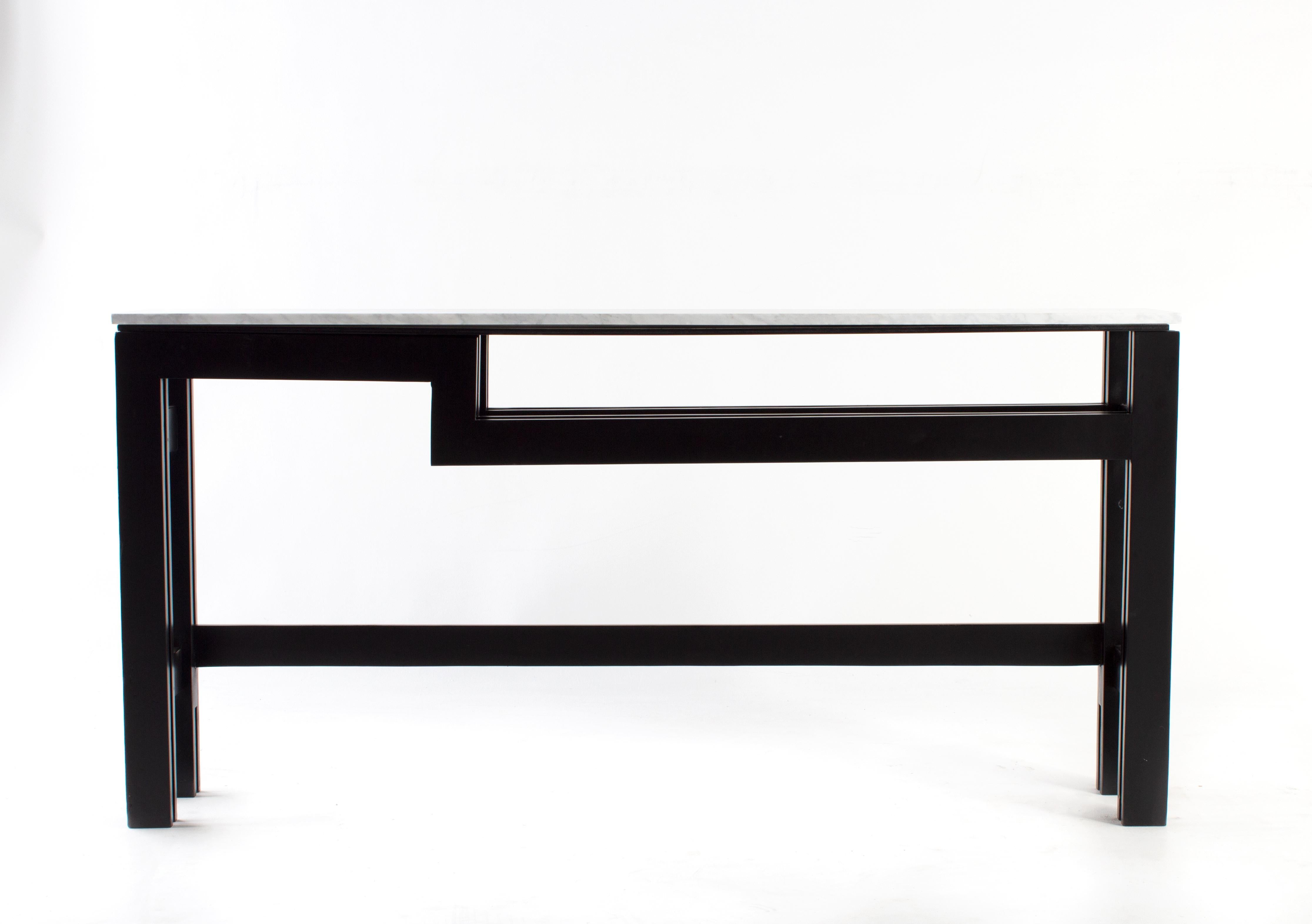 Vintage Italian modernist black wood console table with leathered Carrara marble top. In my organic, contemporary, vintage and mid-century modern aesthetic.

This piece is a part of Brendan Bass’s one-of-a-kind collection, Le Monde. French for “The