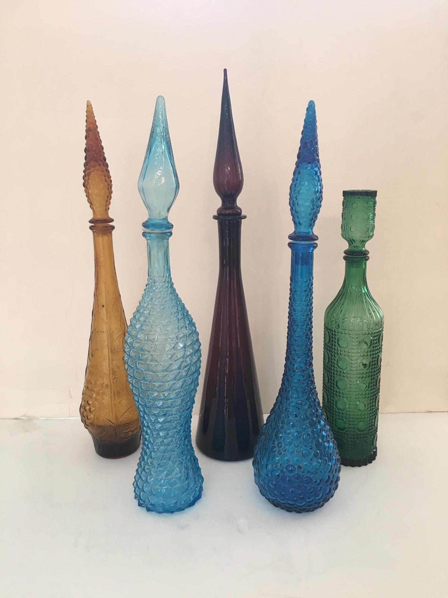 Vintage Italian Multi-Colored Geometric Design Empoli Glass Genie Decanter Bottles with Stoppers, and here is Individual Dimensions:
Net Price for each Bottle: $580.00
Amber Color Bottle: 23