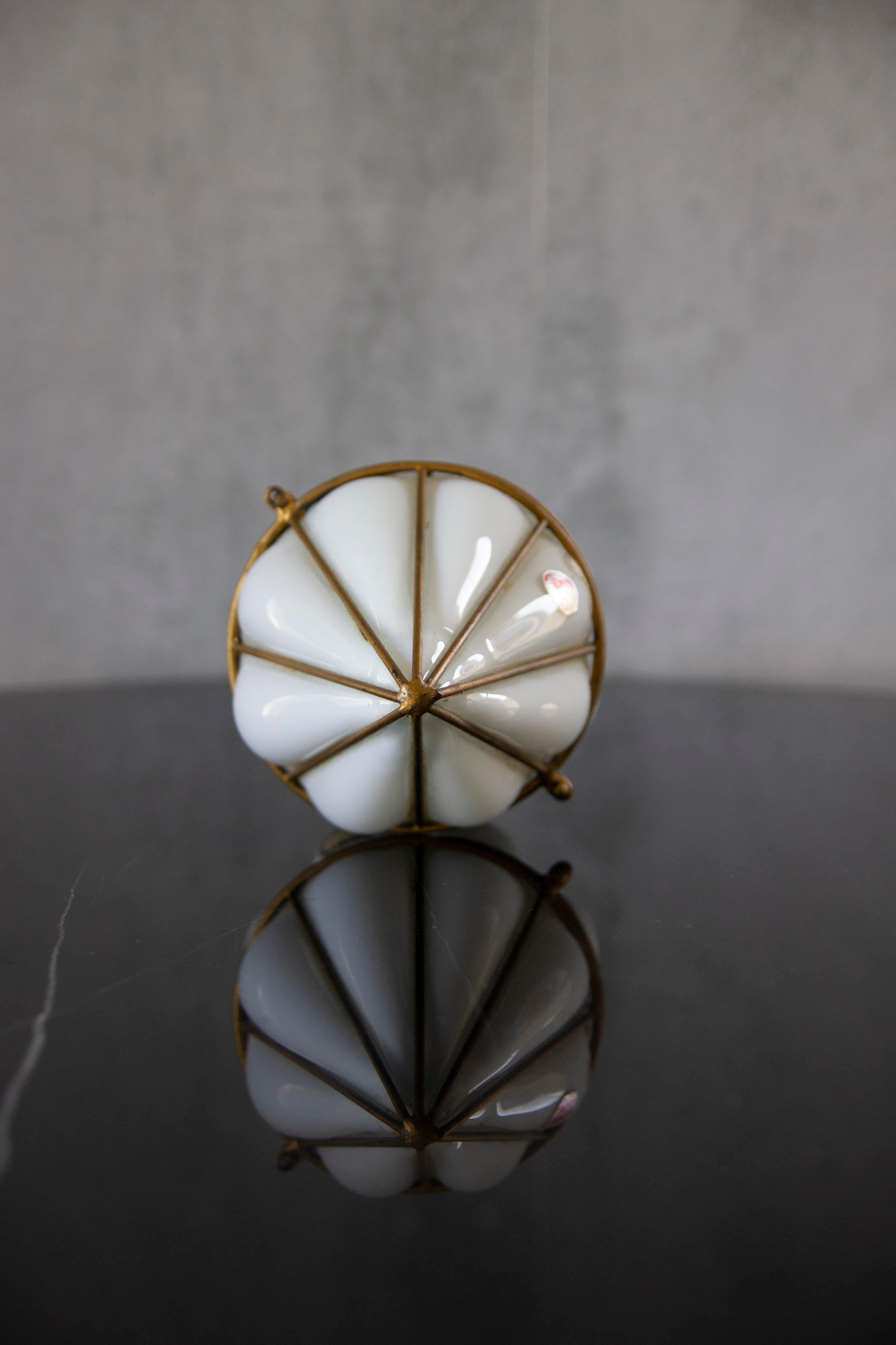 Beautiful vintage Murano art glass cream & brass. Very well done, still has the original label on it. A truly gorgeous piece to add to your living spaces.