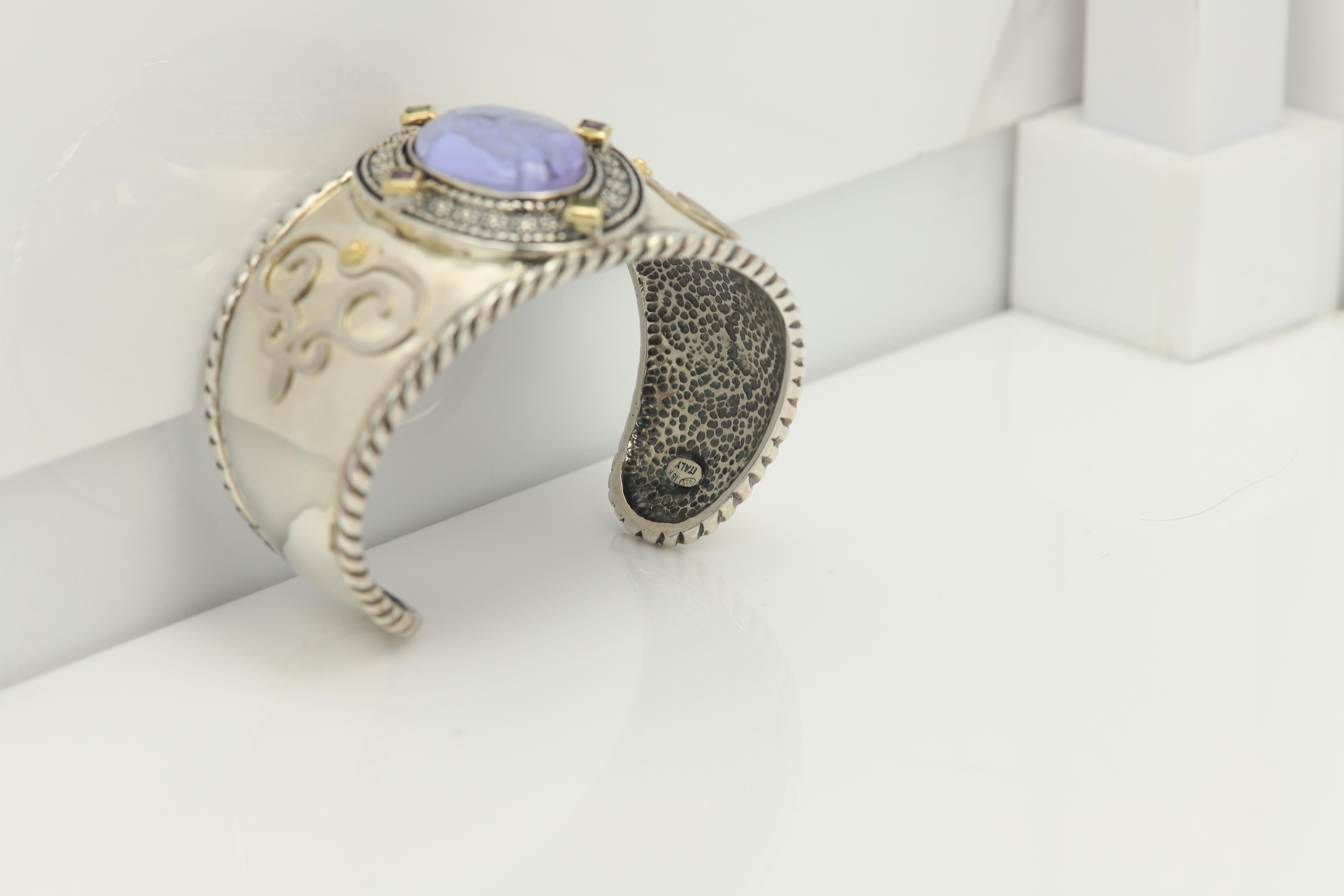 Vintage Cuff 
Venetian Green Murano Glass Antique / Gothic Style Cuff Bracelet
Image of Venus and Cupid - Goddess associated with love, beauty and fertility
Sterling Silver 925 approx  54.0 Grams, 
with small natural Amethyst and Peridot stones,
set