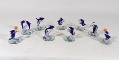 Figuras de mesa vintage de cristal de Murano italiano con forma de delfín: un juego de nueve