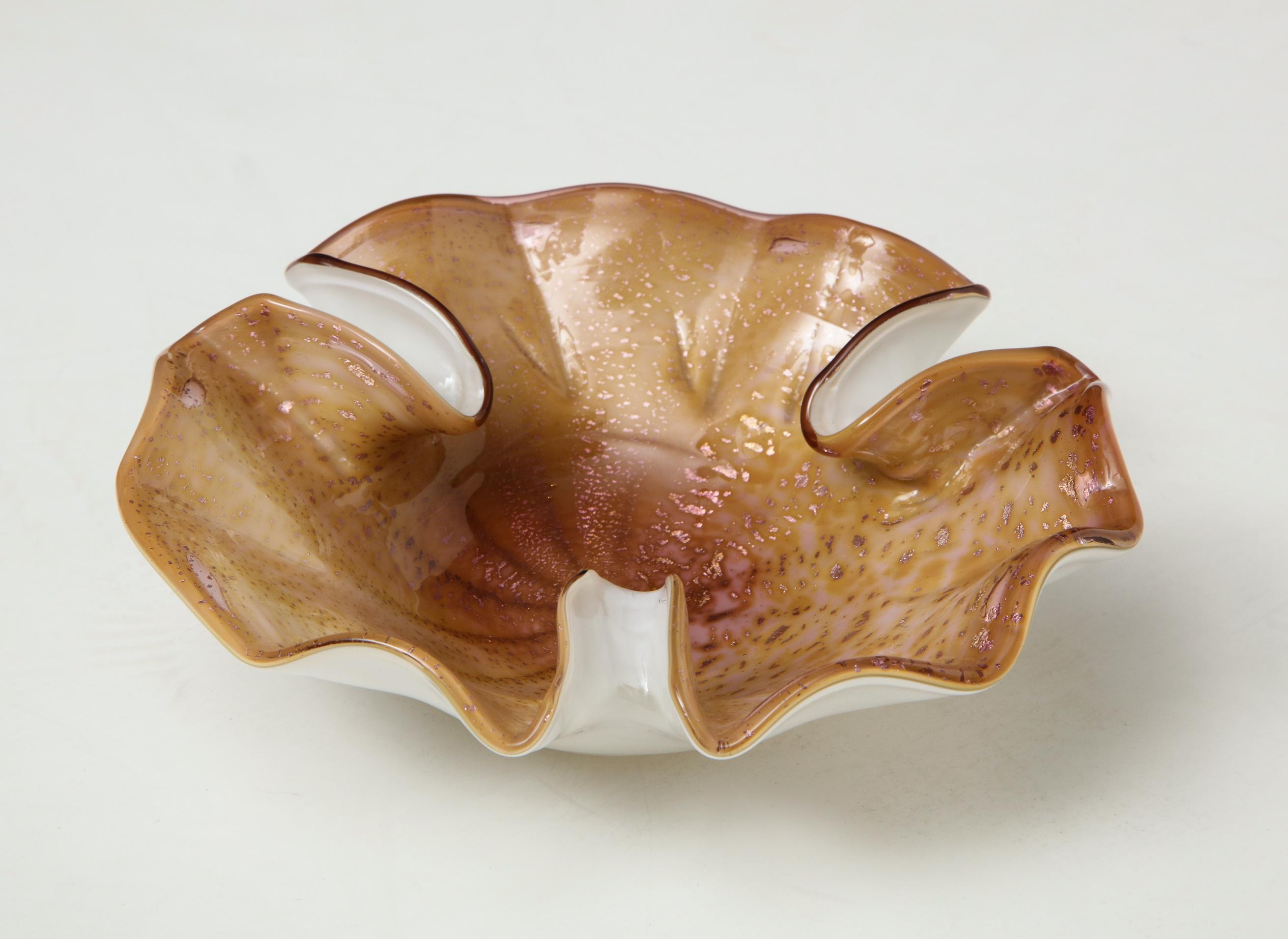 Vintage Italian Murano glass leaf bowl in amber color.